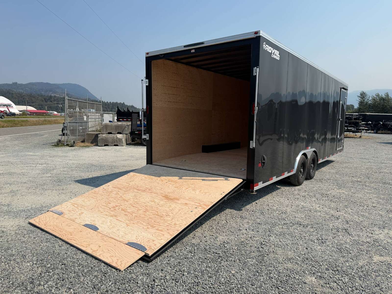 Photo of 2027 Royal Cargo 8.5x24 V Nose Car Hauler Cargo / Enclosed Trailer 11,400lb GVW GLOSS Black Ramp Door Extra Height (GSR)