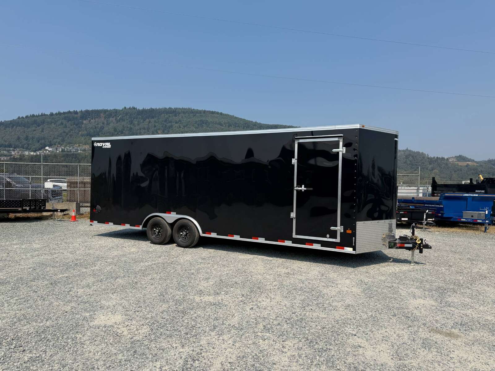 Photo of 2027 Royal Cargo 8.5x24 V Nose Car Hauler Cargo / Enclosed Trailer 11,400lb GVW GLOSS Black Ramp Door Extra Height (GSR)