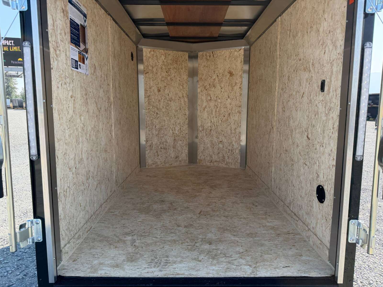 Photo of 2027 Impact 5x8 Quake V Nose Cargo Enclosed Trailer Ramp Door Black 2990lb GVW