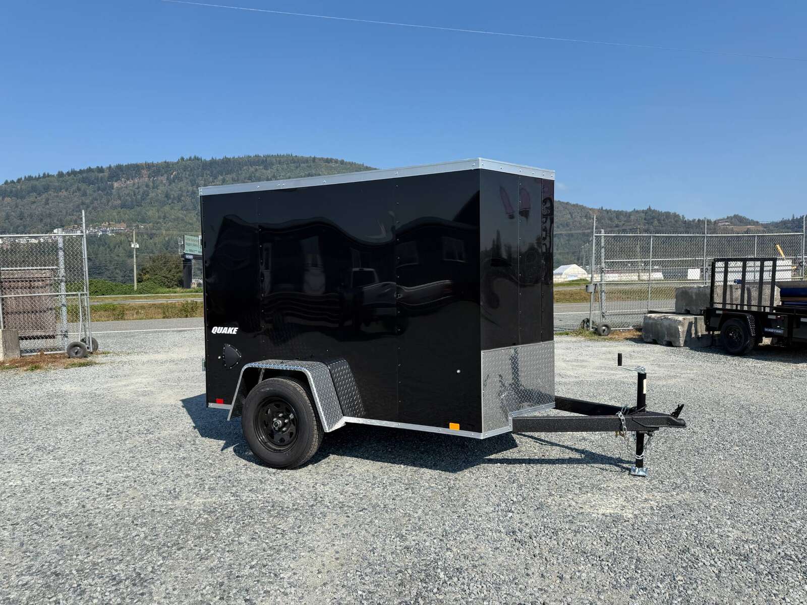 Photo of 2027 Impact 5x8 Quake V Nose Cargo Enclosed Trailer Ramp Door Black 2990lb GVW