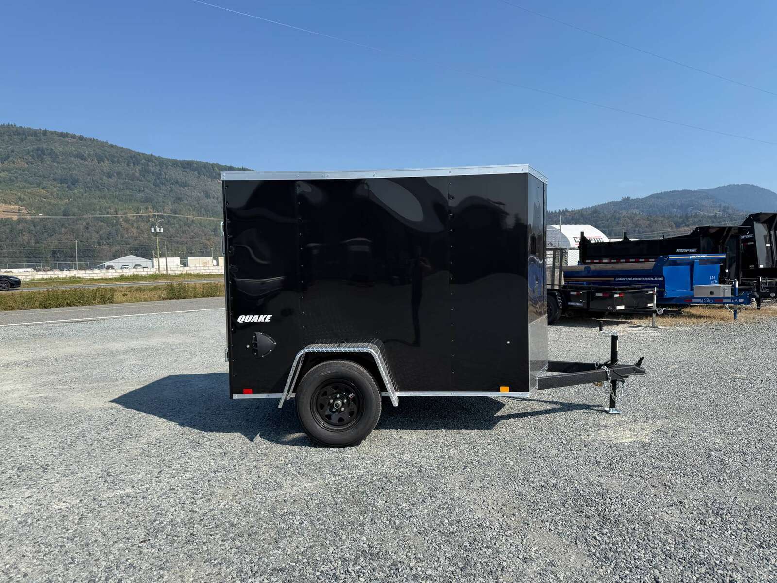 Photo of 2027 Impact 5x8 Quake V Nose Cargo Enclosed Trailer Ramp Door Black 2990lb GVW