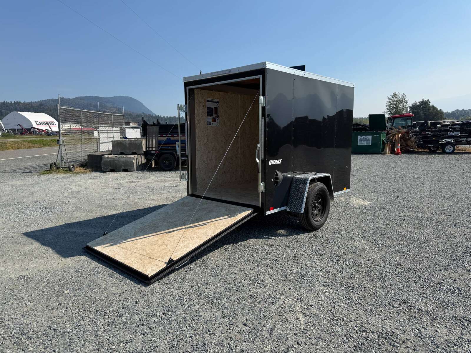 Photo of 2027 Impact 5x8 Quake V Nose Cargo Enclosed Trailer Ramp Door Black 2990lb GVW