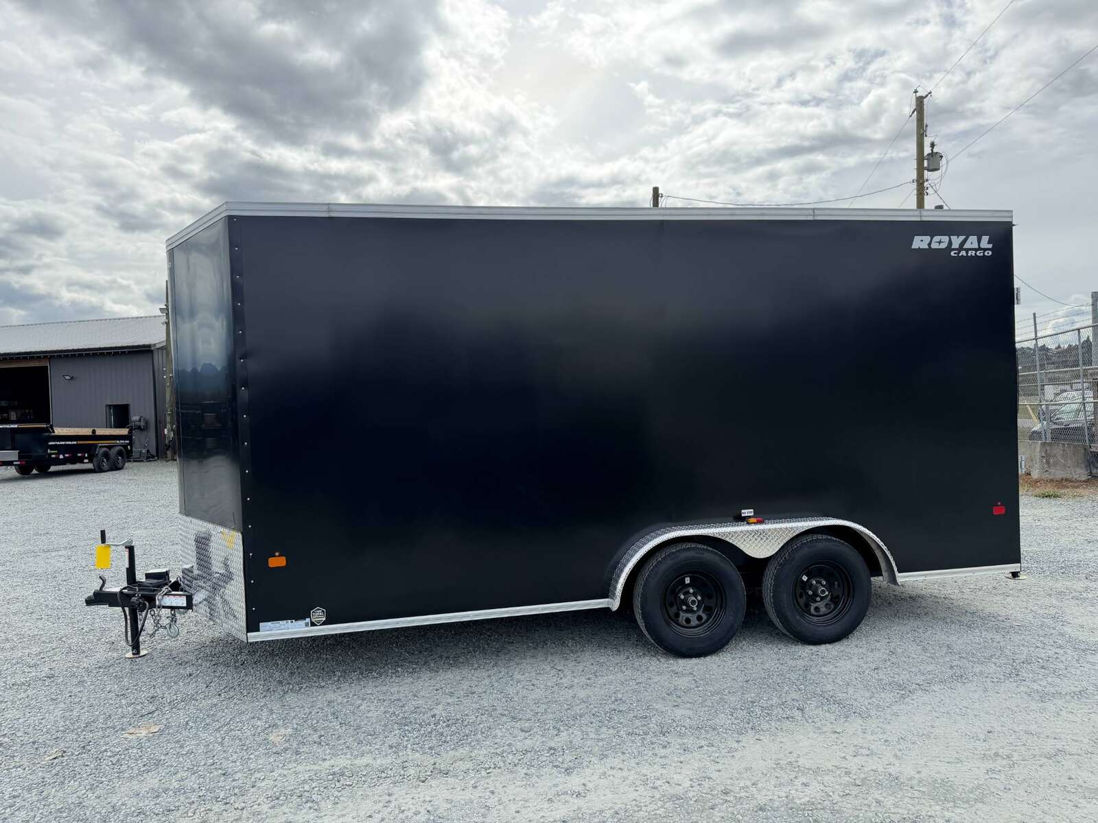 Photo of Pre Owned Used 2026 Royal 7.5X16 V-NOSE RAMP DOOR EXTRA HEIGHT Cargo / Enclosed Trailer Black 7700lb GVW