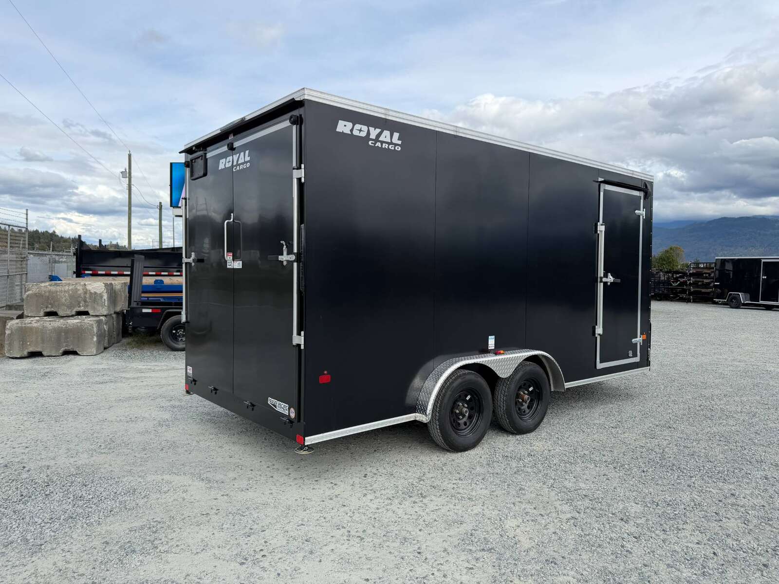 Photo of Pre Owned Used 2026 Royal 7.5X16 V-NOSE RAMP DOOR EXTRA HEIGHT Cargo / Enclosed Trailer Black 7700lb GVW