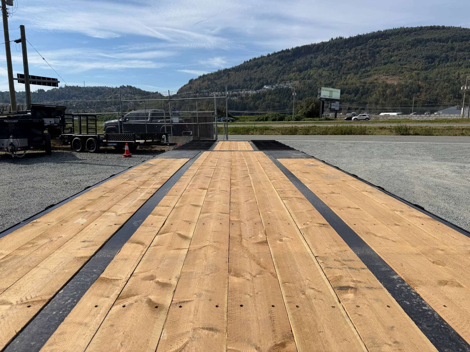 Photo of 2027 Southland 32' Gooseneck Equipment Flat Deck Trailer 38,000lbs w/ 12' Hydraulic Dovetail