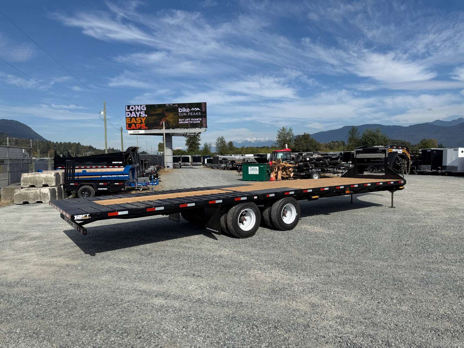 Photo of 2027 Southland 32' Gooseneck Equipment Flat Deck Trailer 38,000lbs w/ 12' Hydraulic Dovetail