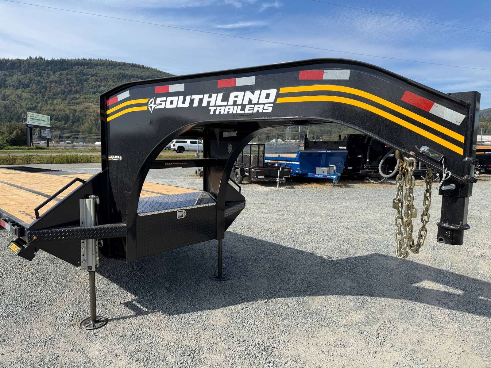 Photo of 2027 Southland 32' Gooseneck Equipment Flat Deck Trailer 38,000lbs w/ 12' Hydraulic Dovetail