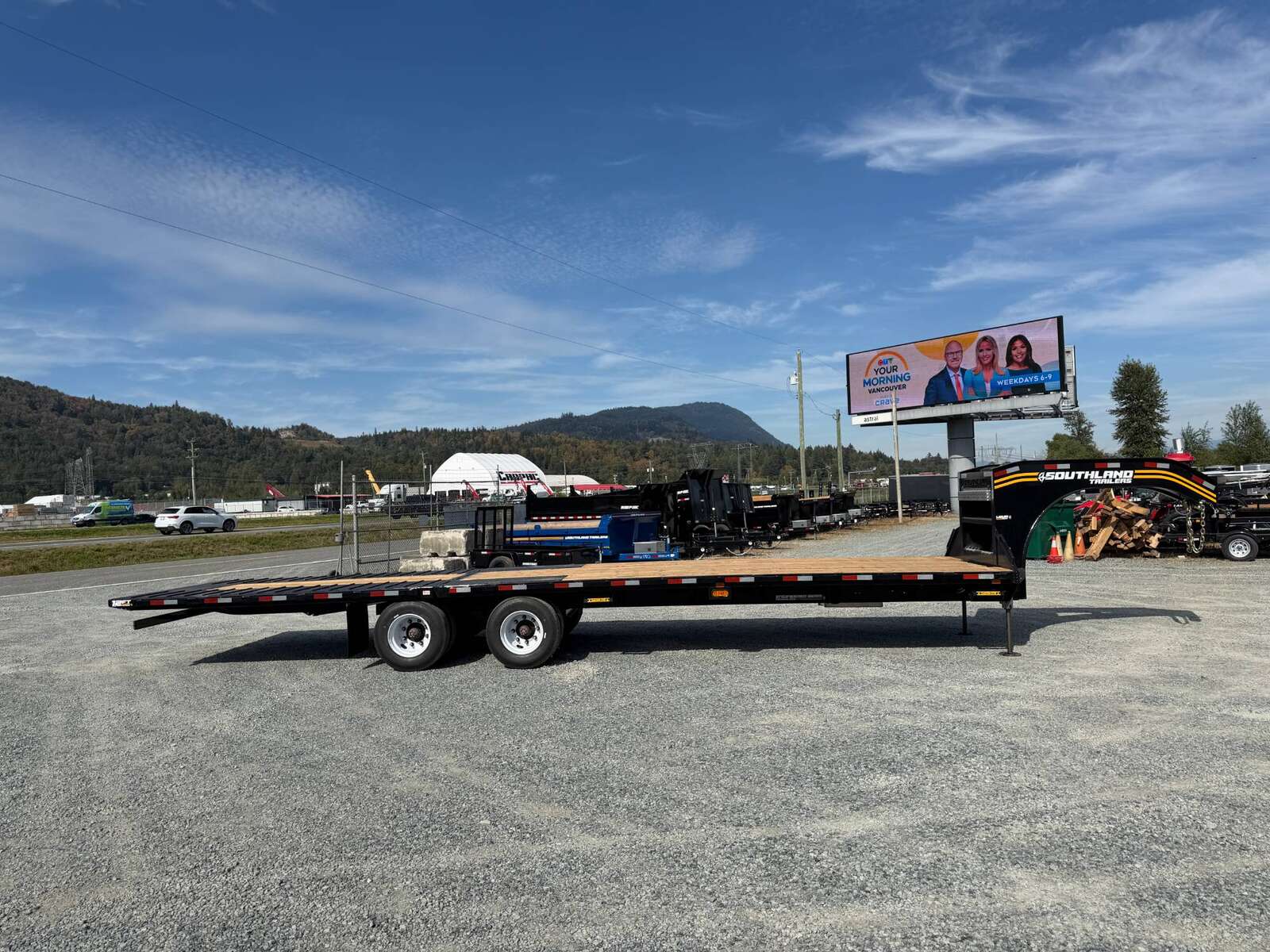 Photo of 2027 Southland 32' Gooseneck Equipment Flat Deck Trailer 38,000lbs w/ 12' Hydraulic Dovetail