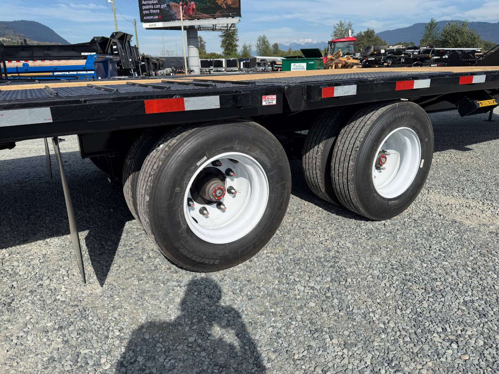 Photo of 2027 Southland 32' Gooseneck Equipment Flat Deck Trailer 38,000lbs w/ 12' Hydraulic Dovetail