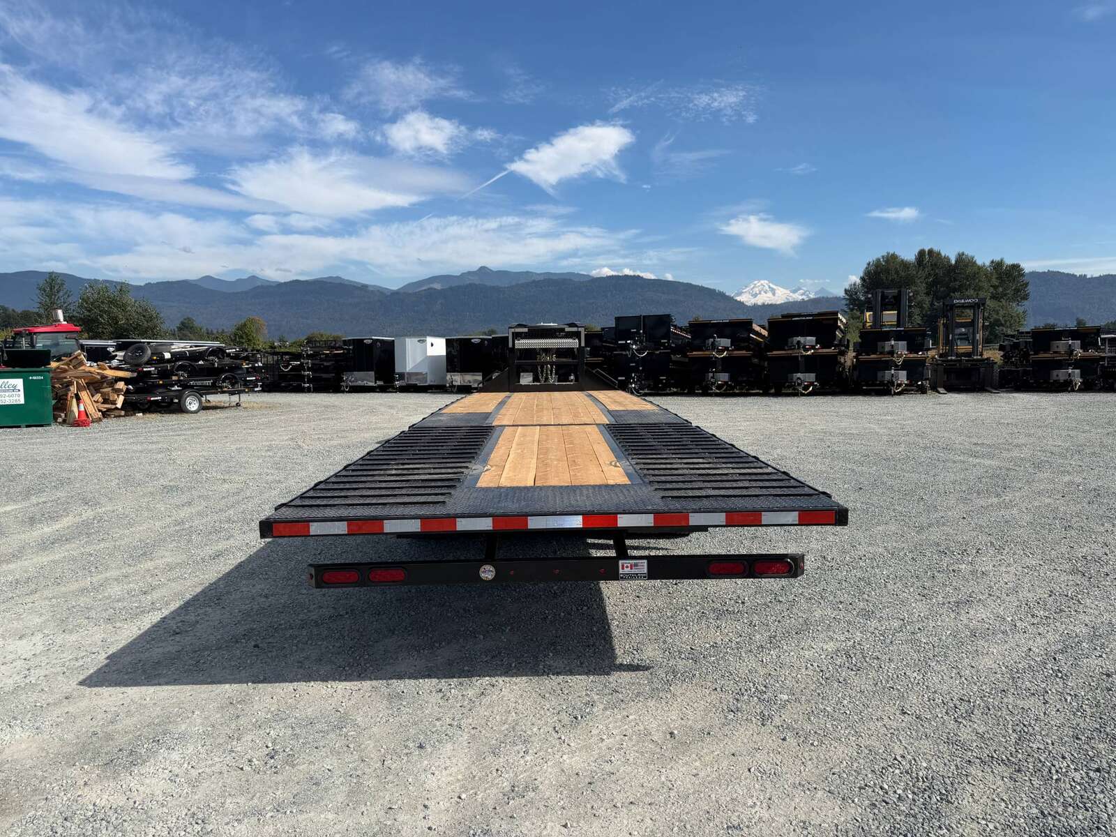 Photo of 2027 Southland 32' Gooseneck Equipment Flat Deck Trailer 38,000lbs w/ 12' Hydraulic Dovetail