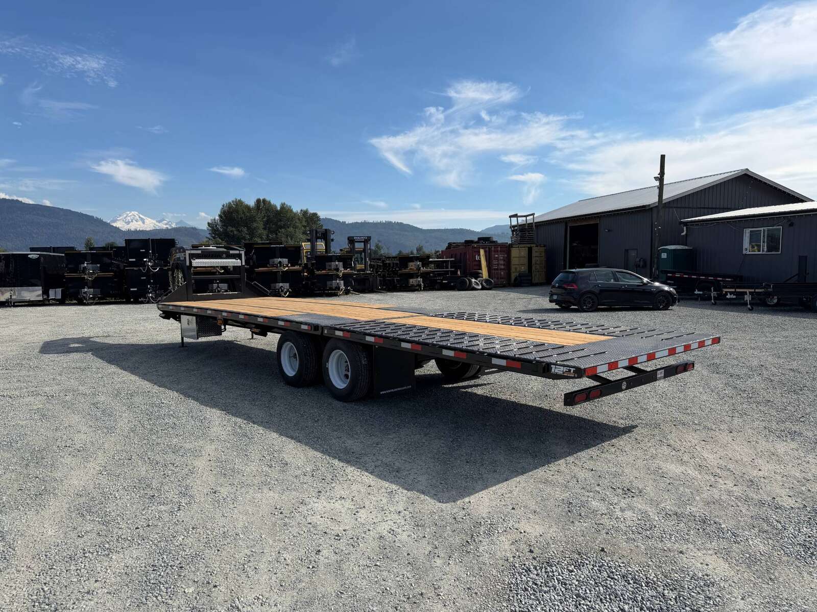 Photo of 2027 Southland 32' Gooseneck Equipment Flat Deck Trailer 38,000lbs w/ 12' Hydraulic Dovetail