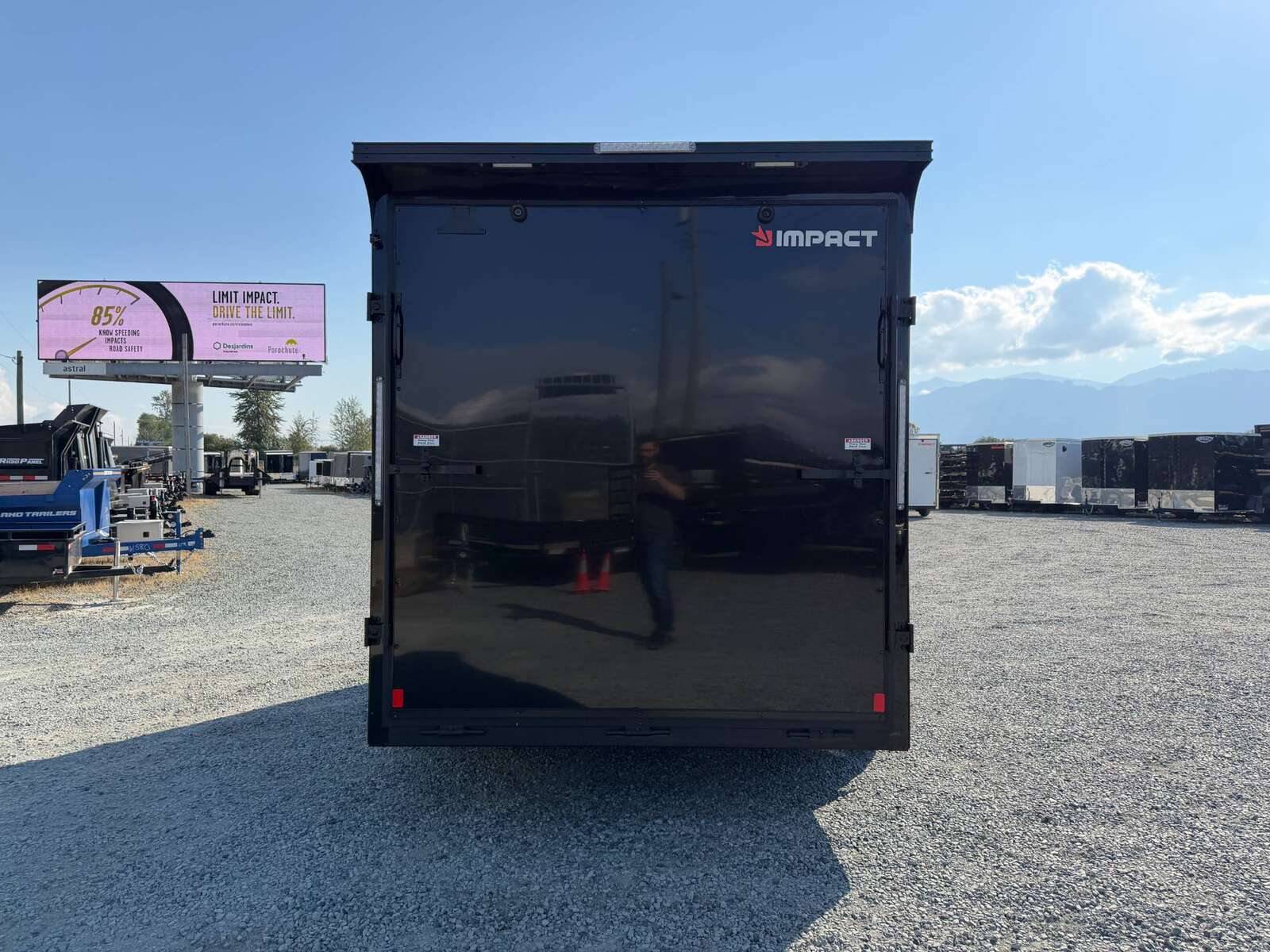 Photo of 2027 Impact Quake 7x12 V Nose Cargo / Enclosed Trailer / Black Polycor Exterior / 5000lb GVW Brake Axle w/ Ramp Door