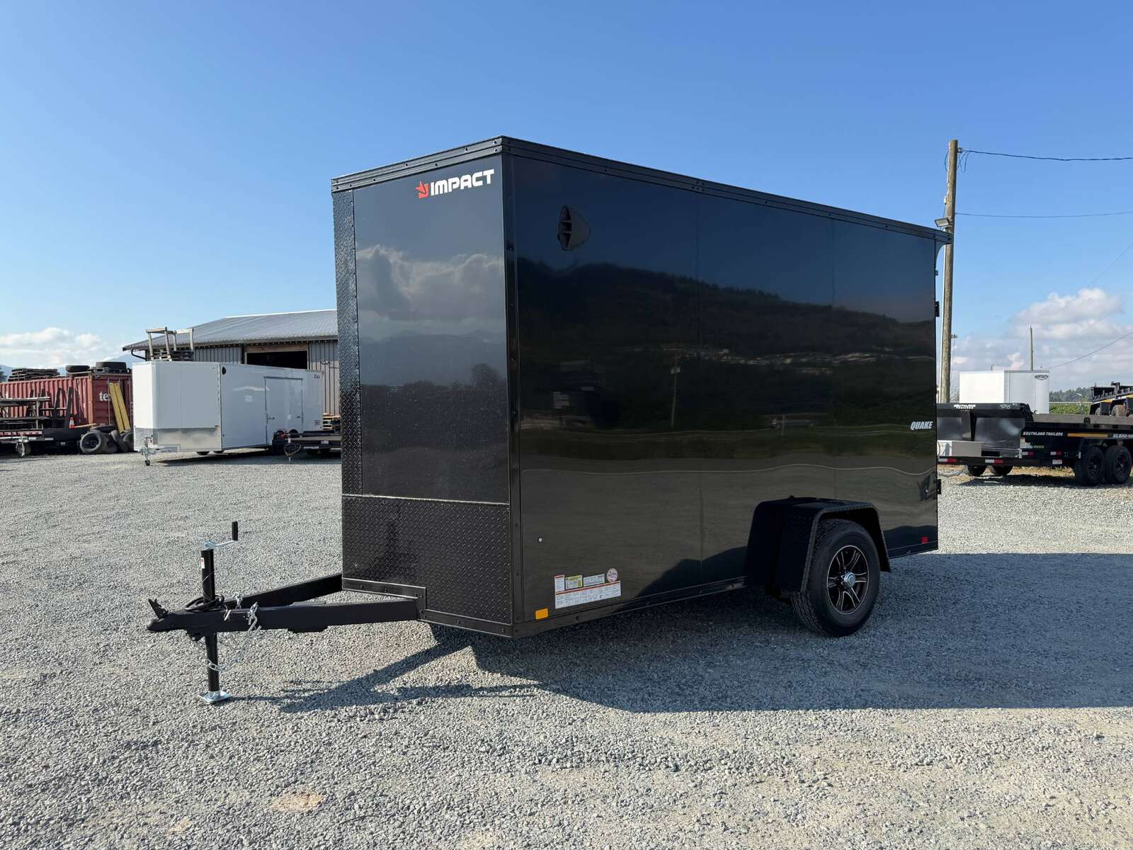 Photo of 2027 Impact Quake 7x12 V Nose Cargo / Enclosed Trailer / Black Polycor Exterior / 5000lb GVW Brake Axle w/ Ramp Door