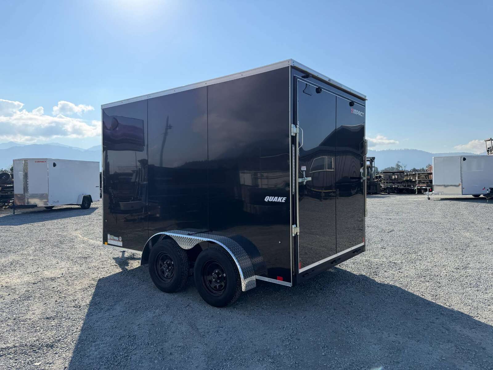 Photo of 2027 Impact Quake 7x12 Cargo Enclosed Trailer Tandem Axle 7000lb GVW / POLYCOR Black Exterior / Extra Height w/ Ramp Door