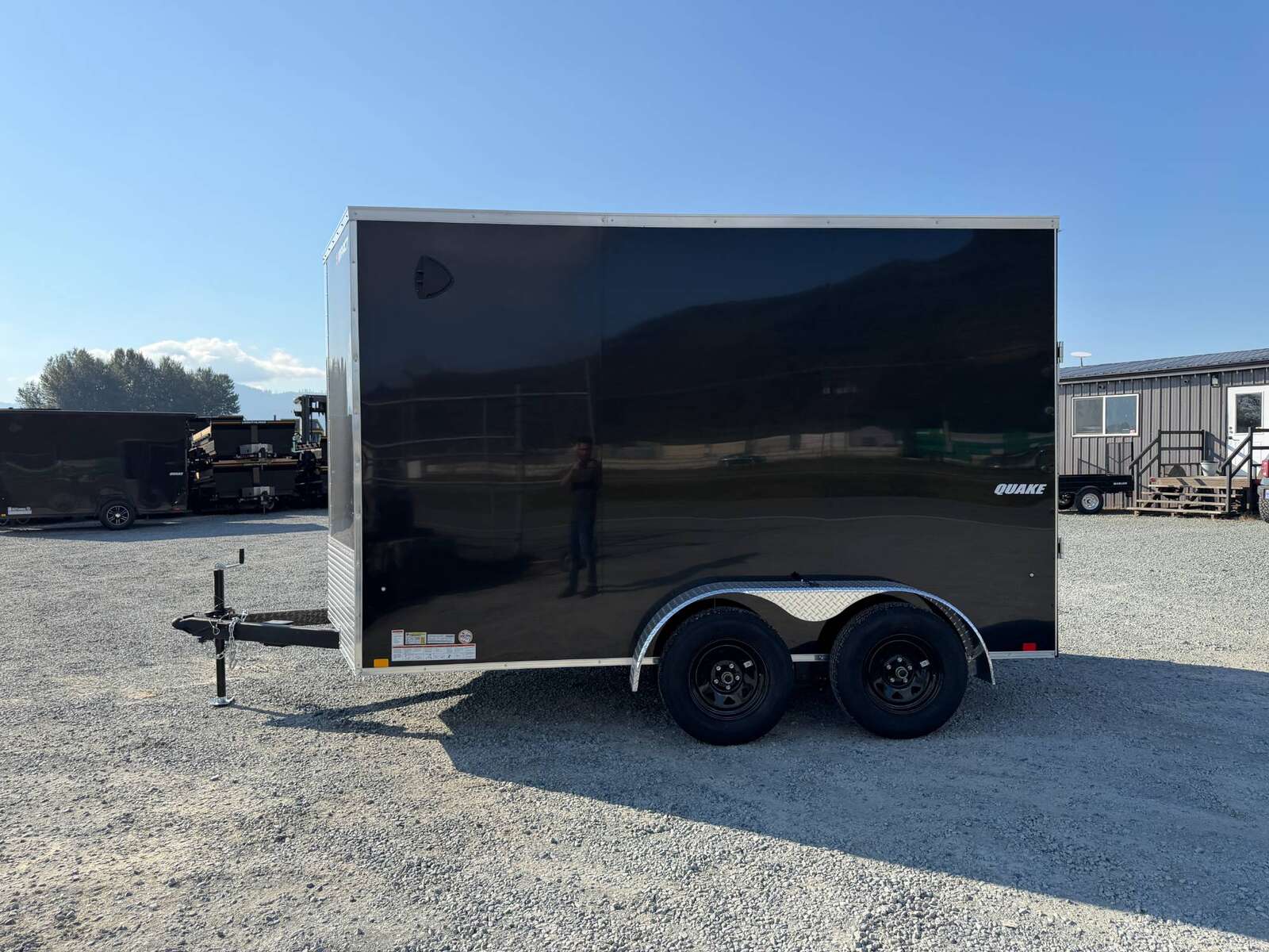 Photo of 2027 Impact Quake 7x12 Cargo Enclosed Trailer Tandem Axle 7000lb GVW / POLYCOR Black Exterior / Extra Height w/ Ramp Door