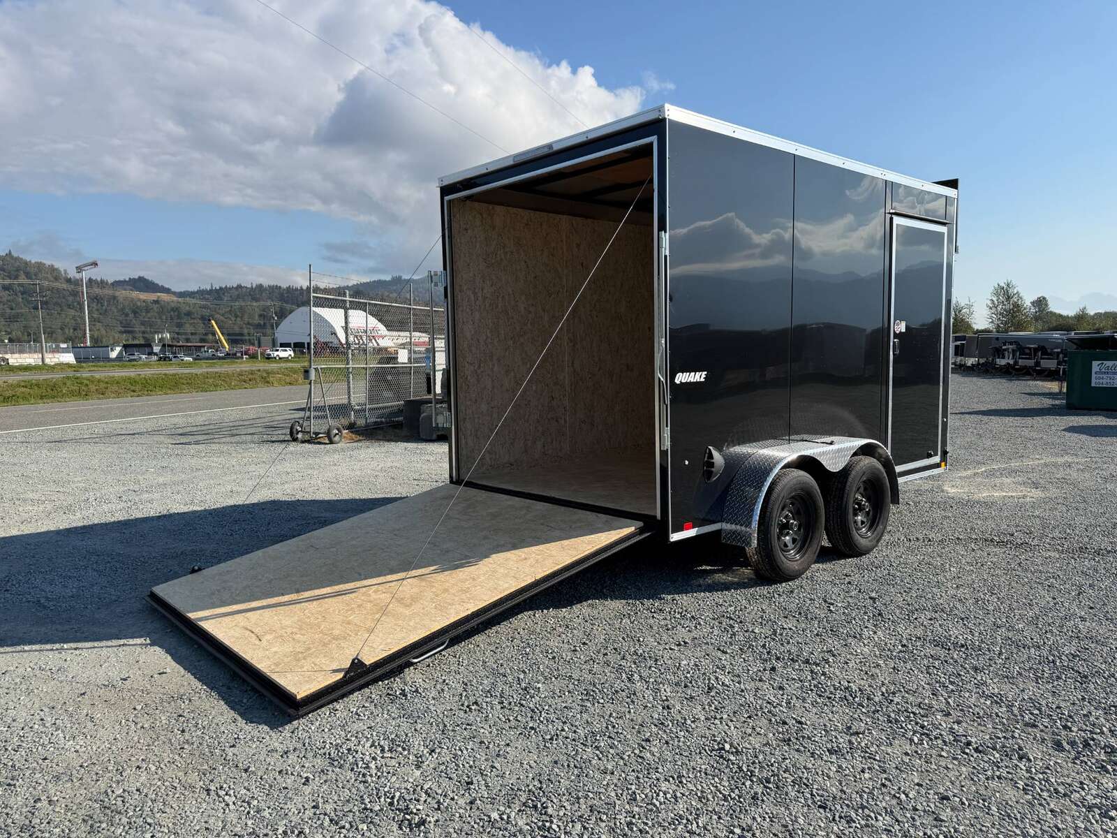 Photo of 2027 Impact Quake 7x12 Cargo Enclosed Trailer Tandem Axle 7000lb GVW / POLYCOR Black Exterior / Extra Height w/ Ramp Door