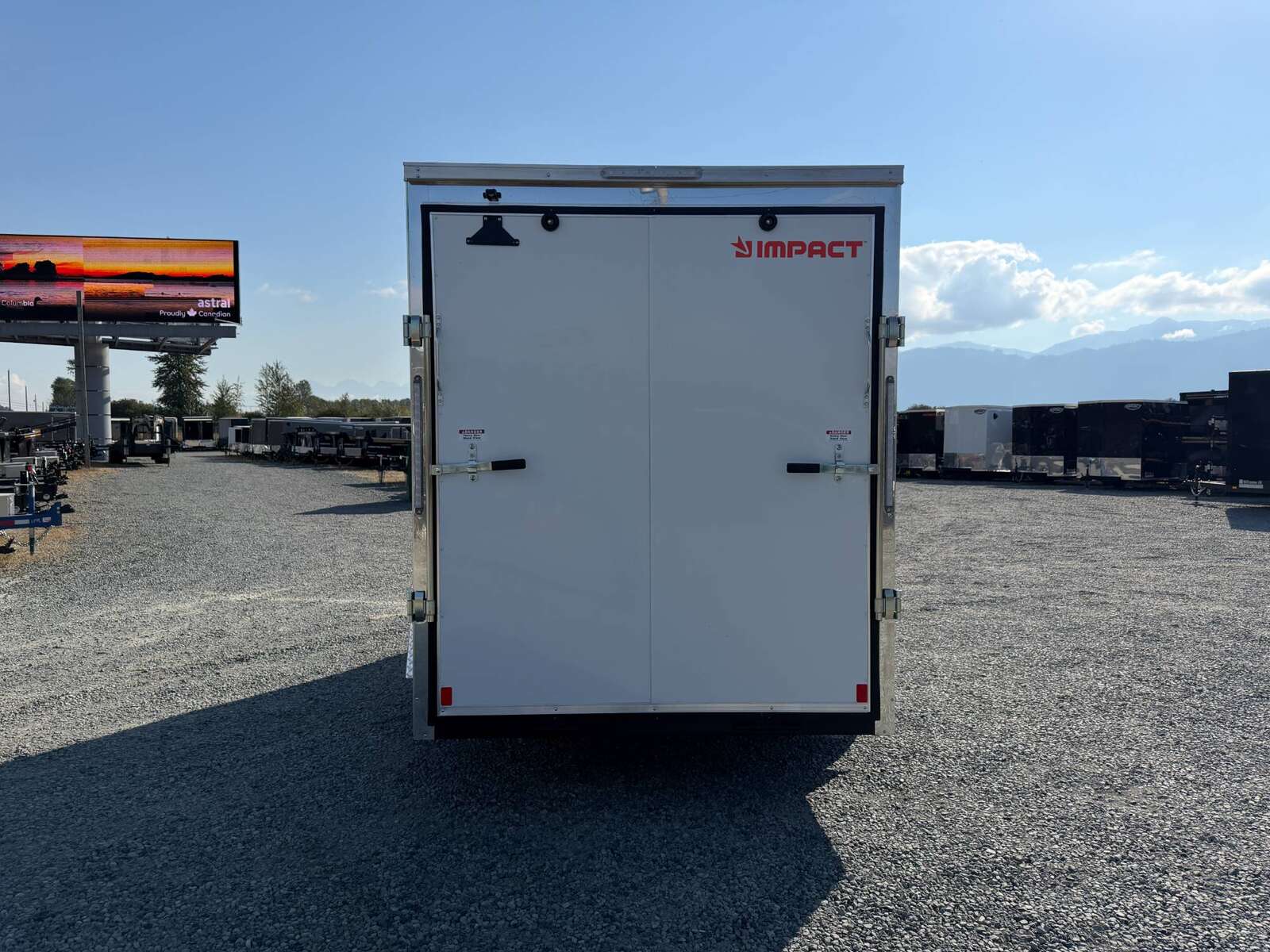 Photo of 2027 Impact Quake 6x12 V Nose Cargo / Enclosed Trailer / Polycor White Exterior / Ramp Door Extra Height 2990lb GVW