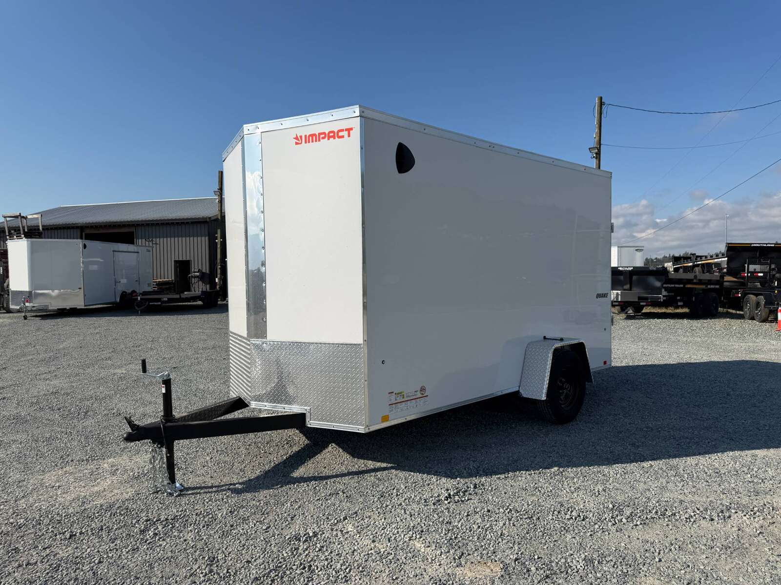Photo of 2027 Impact Quake 6x12 V Nose Cargo / Enclosed Trailer / Polycor White Exterior / Ramp Door Extra Height 2990lb GVW