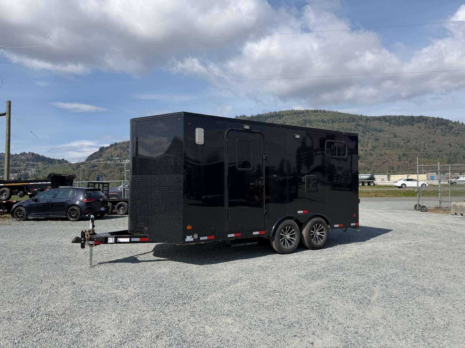 Photo of 2027 Royal 8.5x16 V Nose Cargo Enclosed Trailer Camping Package Black w/ Blackout Pkg, Insulated, Ramp Door, White Walls, 2x Windows, Polycor & More!