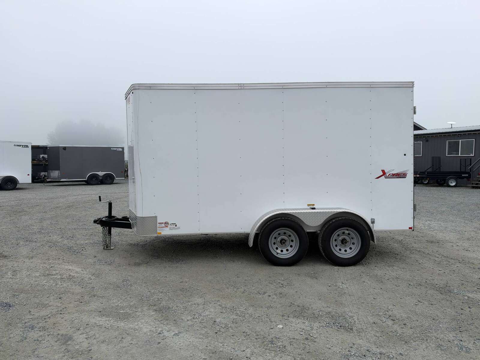 Photo of Pre Owned Used 2021 Mirage Cargo Enclosed V Nose Trailer 6x12 White w/ Barn Doors 7000lb GVW