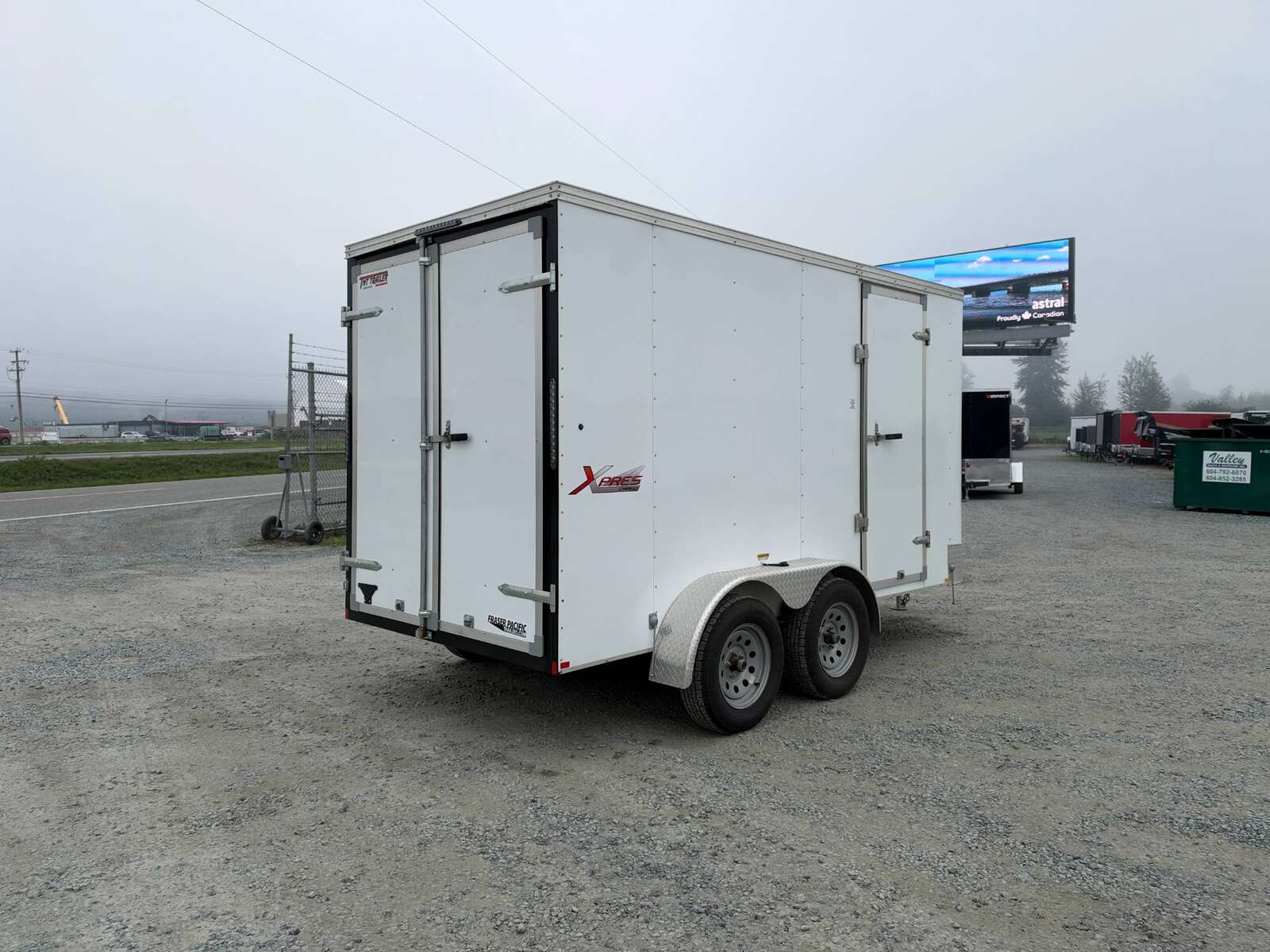 Photo of Pre Owned Used 2021 Mirage Cargo Enclosed V Nose Trailer 6x12 White w/ Barn Doors 7000lb GVW