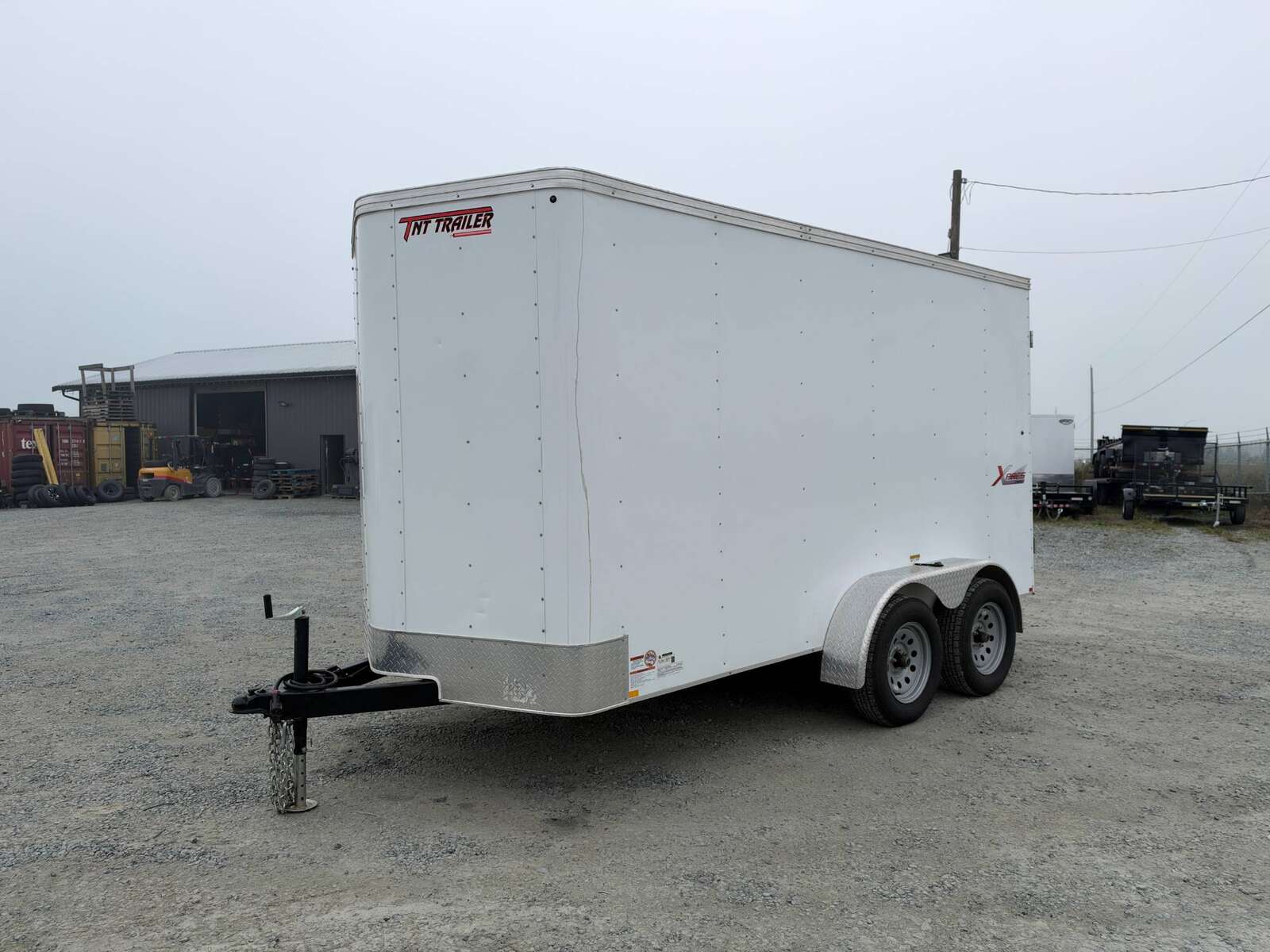 Photo of Pre Owned Used 2021 Mirage Cargo Enclosed V Nose Trailer 6x12 White w/ Barn Doors 7000lb GVW