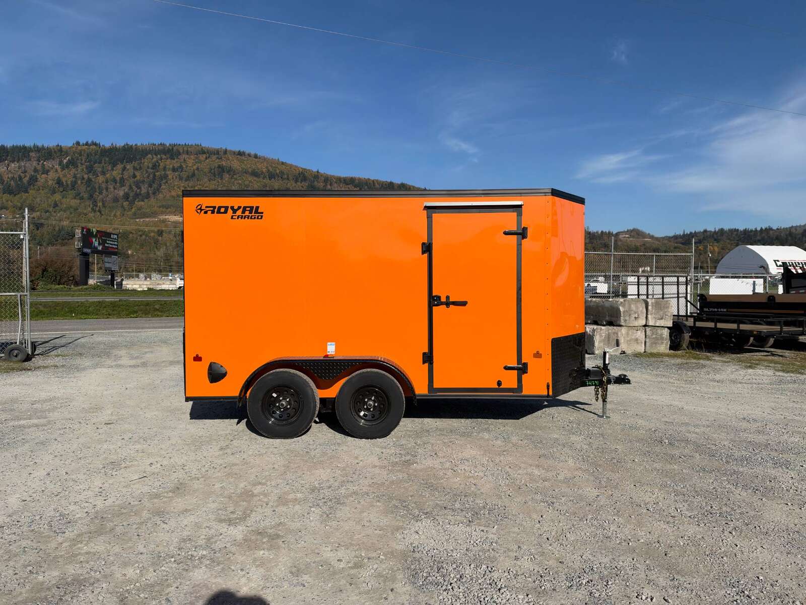 Photo of 2027 Royal Cargo 6x12 V Nose Cargo / Enclosed Trailer Orange Ramp Door w/ Blackout Package Tandem Axle 7700lb GVW (GSR)