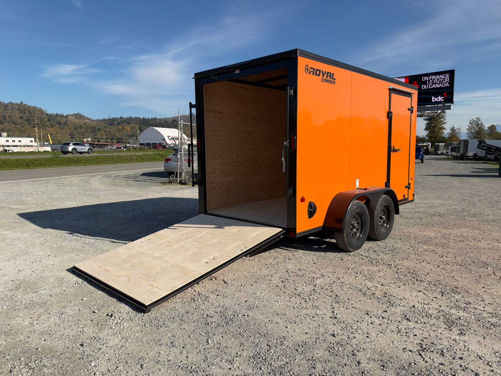 Photo of 2027 Royal Cargo 6x12 V Nose Cargo / Enclosed Trailer Orange Ramp Door w/ Blackout Package Tandem Axle 7700lb GVW (GSR)
