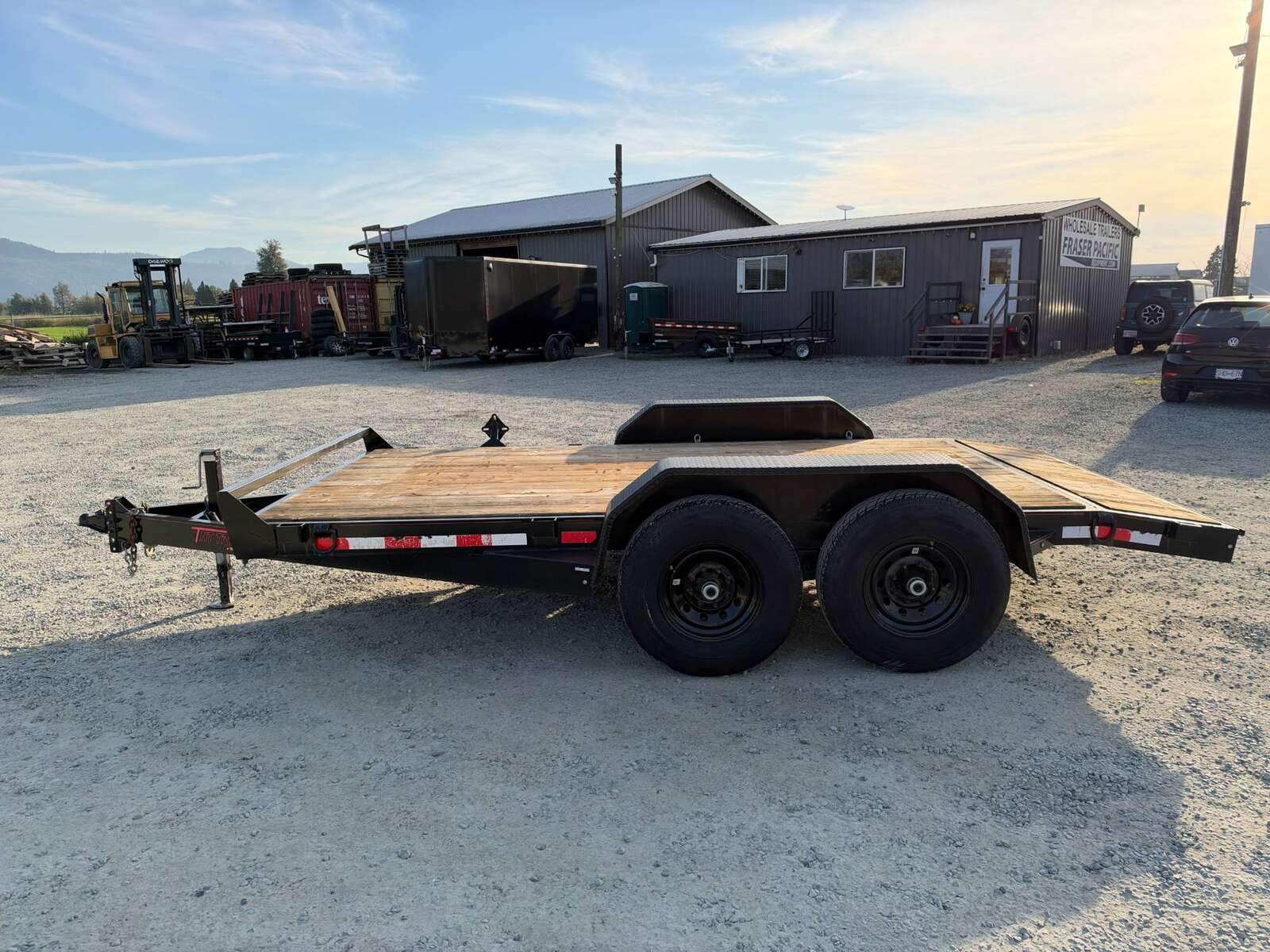 Photo of Pre Owned Used Mirage 7x14 Flat Deck Equipment Trailer 14,000lb GVW w/ Slide Out Ramps