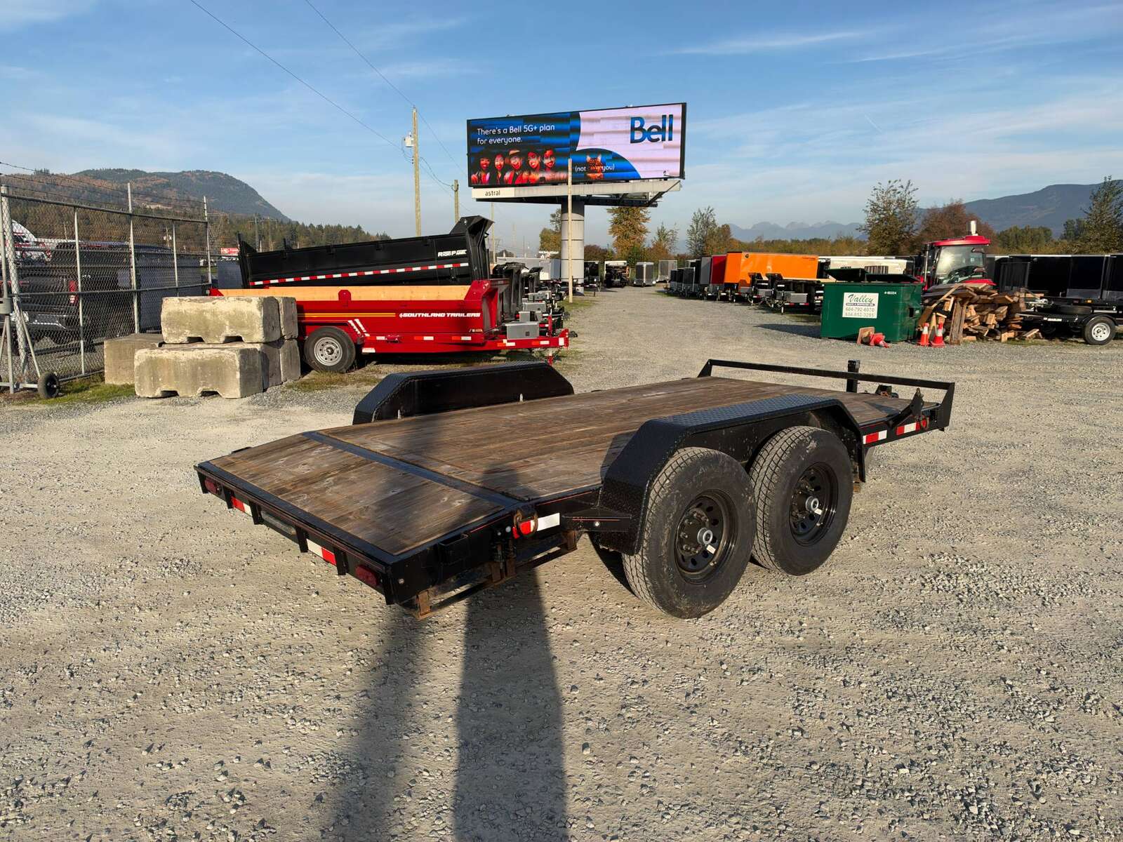 Photo of Pre Owned Used Mirage 7x14 Flat Deck Equipment Trailer 14,000lb GVW w/ Slide Out Ramps