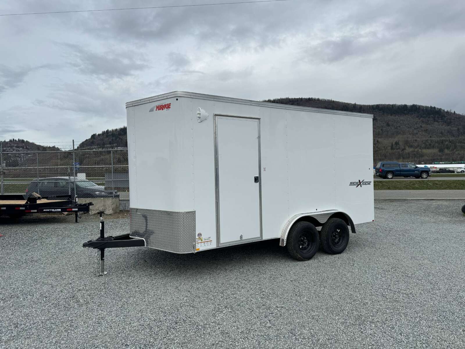 Photo of 2024 TNT 7.5x14 Extra Height Side x Side Package Cargo / Enclosed Trailer Ramp Door White