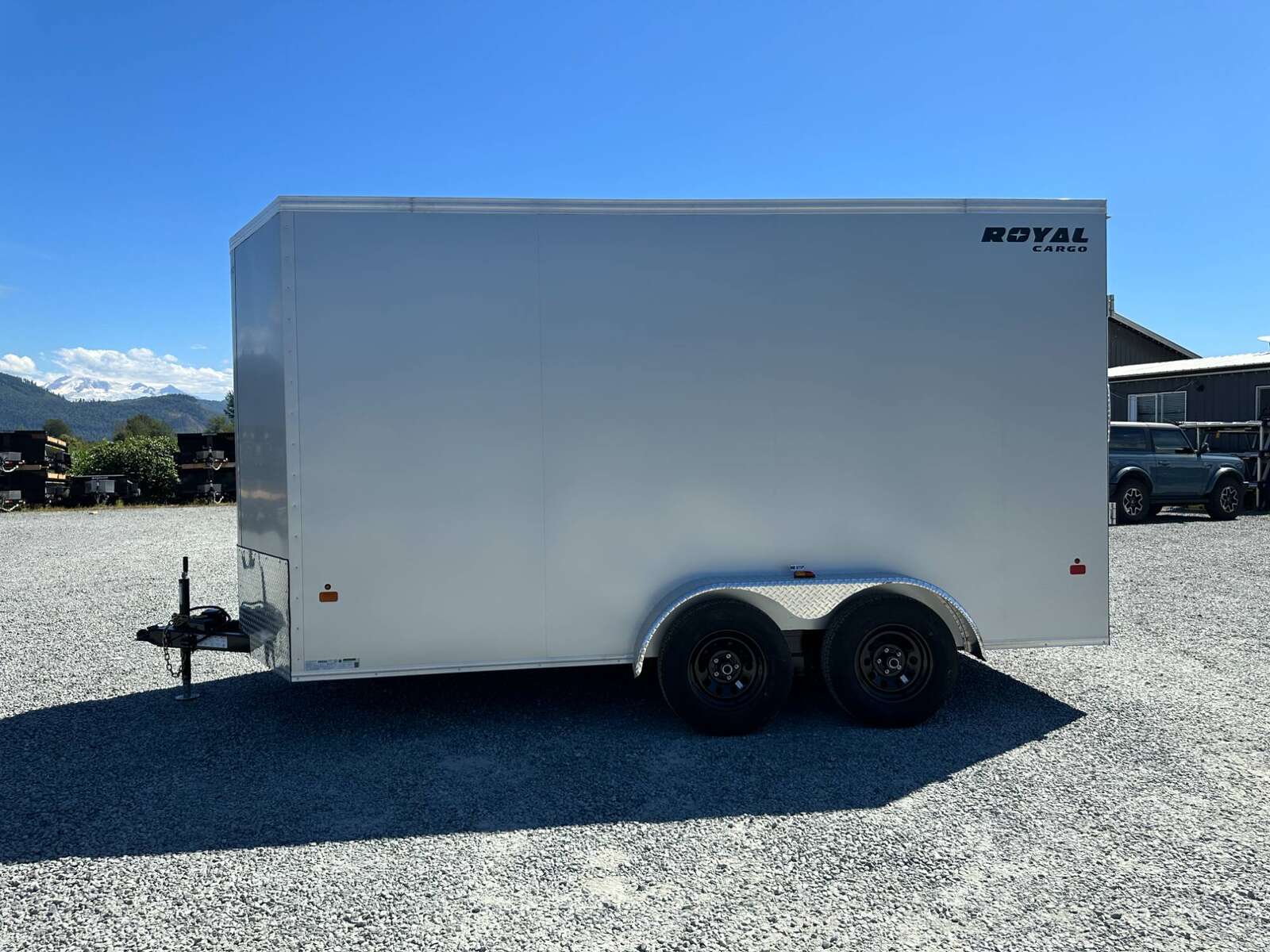 Photo of 2024 Royal Cargo 7X14 V Nose 7700LB GVW RAMP DOOR Enclosed Trailer Extra Tall SILVER