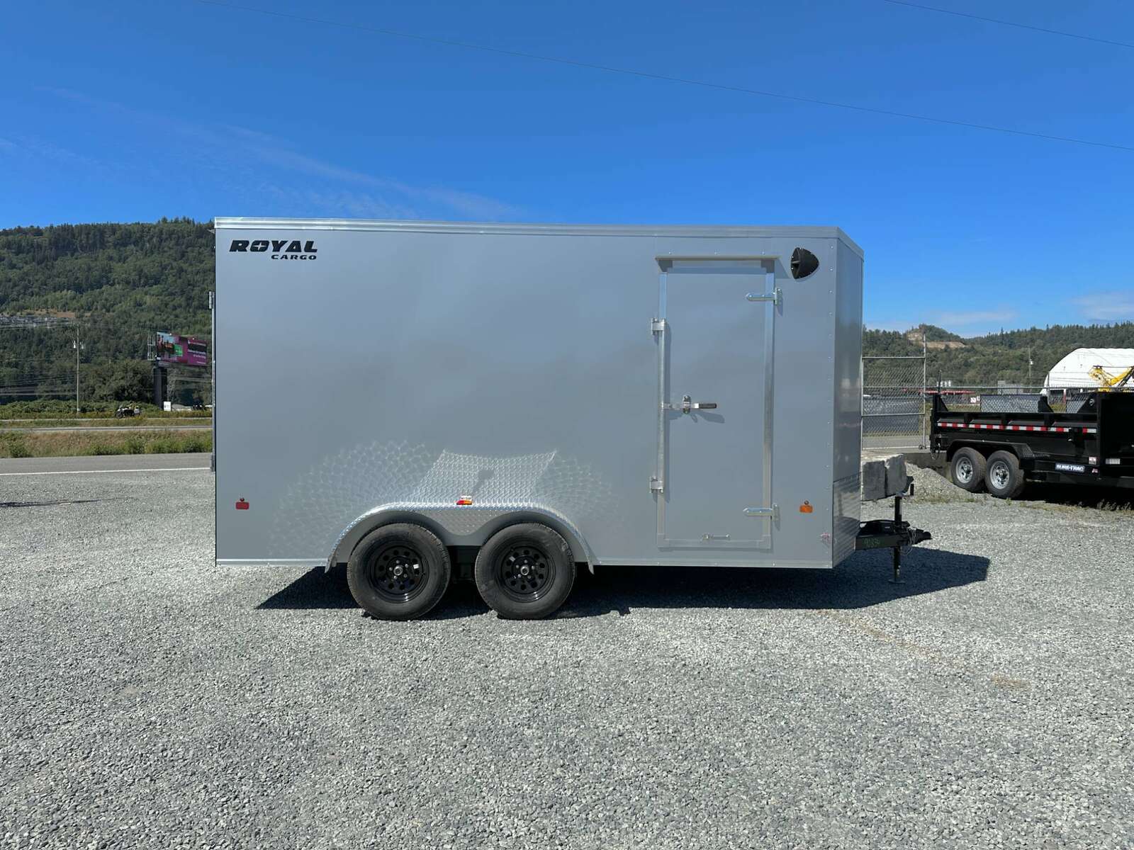 Photo of 2024 Royal Cargo 7X14 V Nose 7700LB GVW RAMP DOOR Enclosed Trailer Extra Tall SILVER