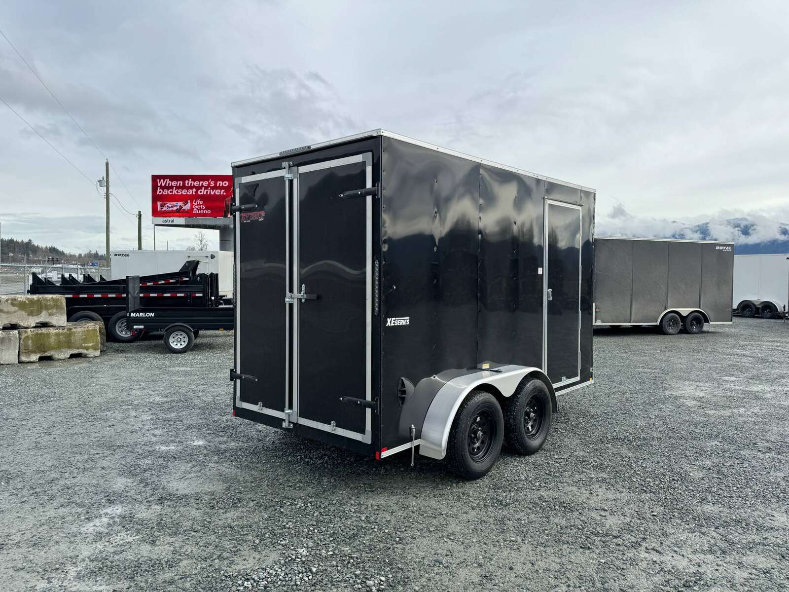 Photo of 2024 Mirage XE 6x12 V Nose Tandem Axle Cargo / Enclosed Trailer Black Barn Doors Extra Height 7,000lb GVW