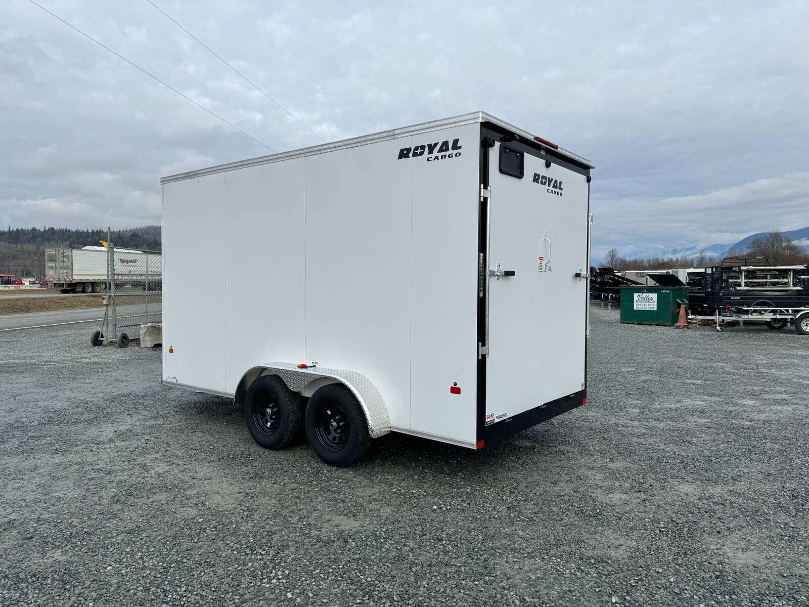 Photo of 2026 Royal 7x14 V Nose Cargo / Enclosed Trailer Extra Height Ramp Door White
