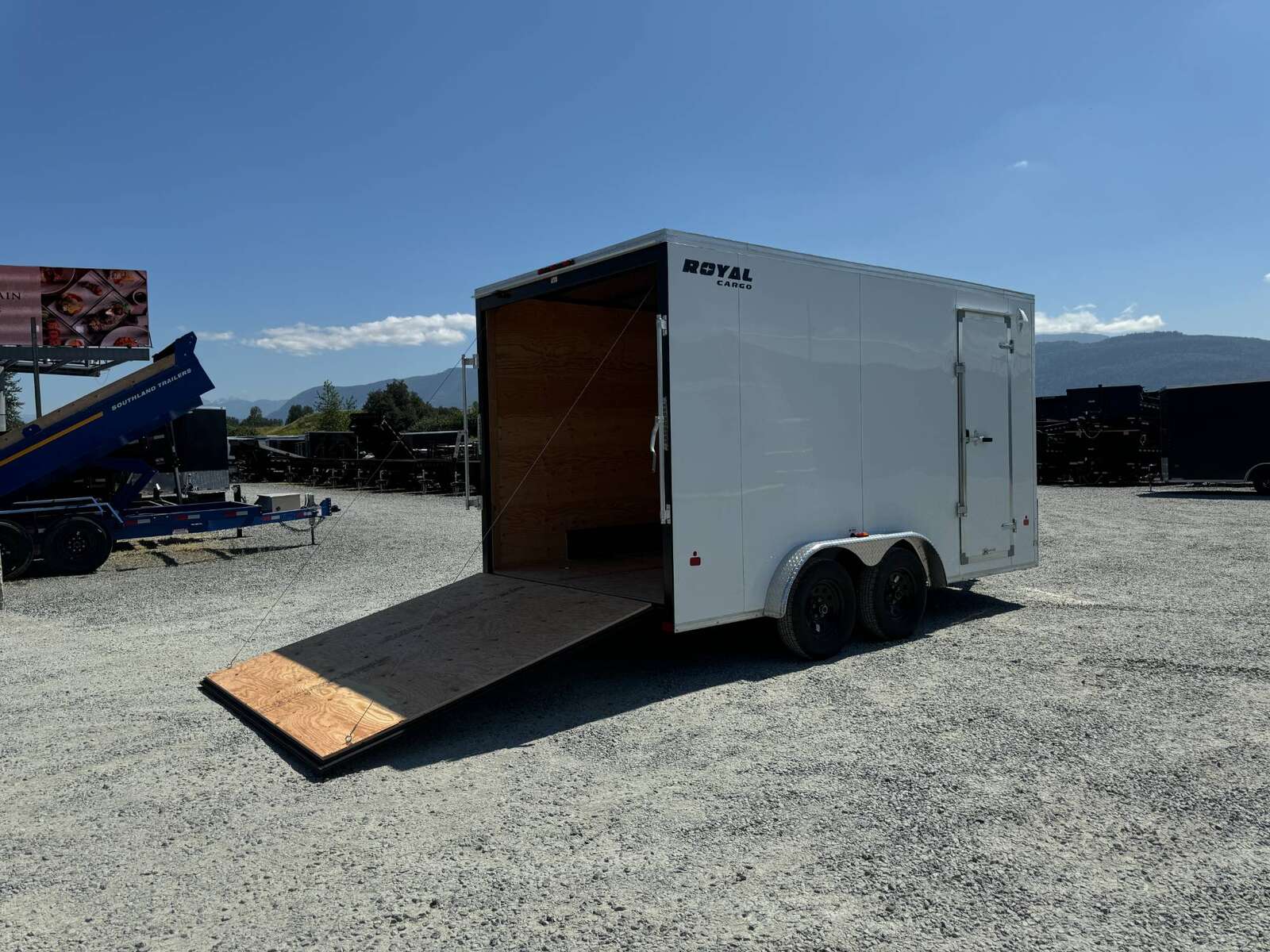 Photo of 2025 Royal 7.5X14 Cargo / Enclosed Trailer RAMP DOOR EXTRA HEIGHT 7700LB GVW WHITE