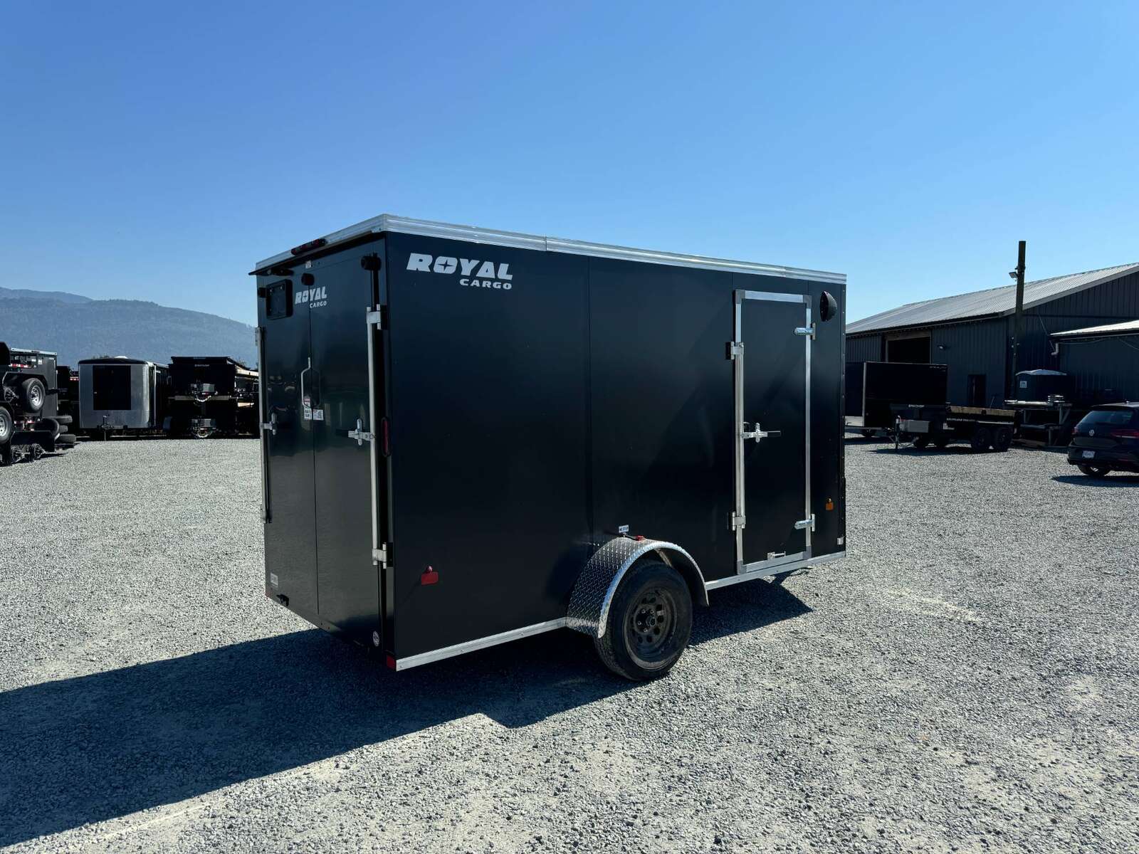 Photo of 2025 Royal Cargo 6x12 V Nose Cargo / Enclosed Trailer Ramp Door Black