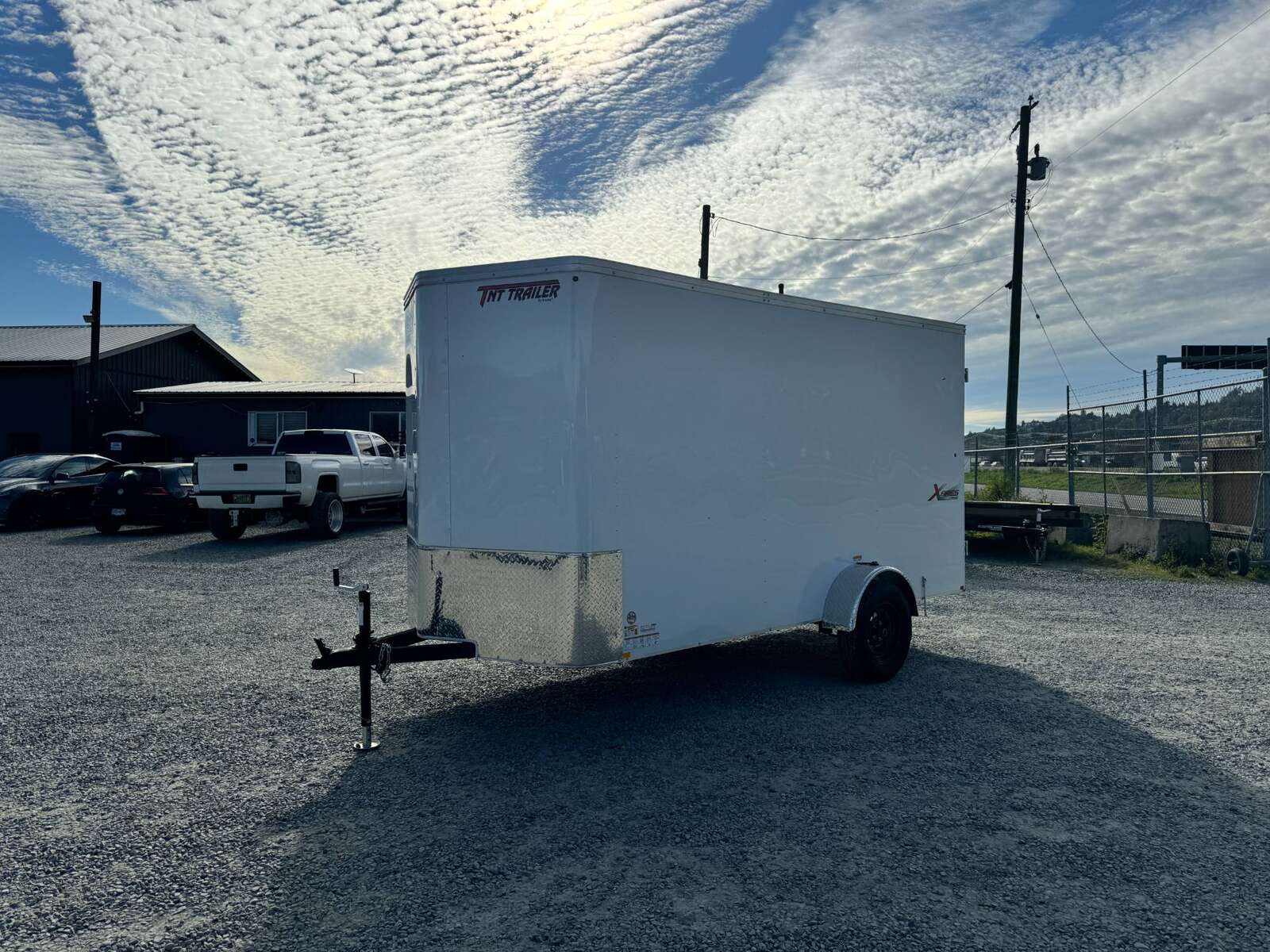 Photo of 2024 Mirage TRAX 6X12 V Nose Enclosed Cargo Trailer 2990GVW WHITE BARN DOOR