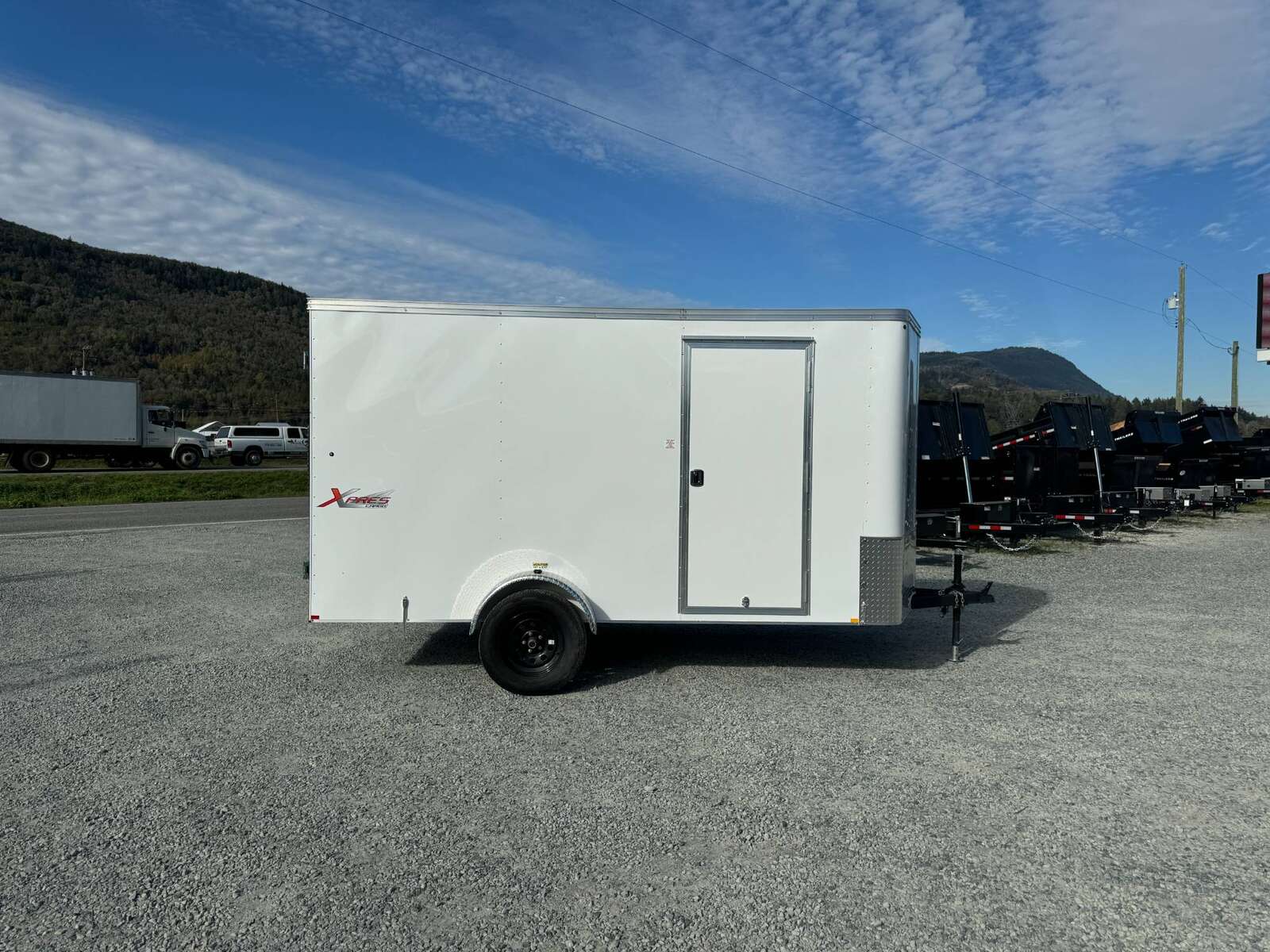 Photo of 2024 Mirage TRAX 6X12 V Nose Enclosed Cargo Trailer 2990GVW WHITE BARN DOOR