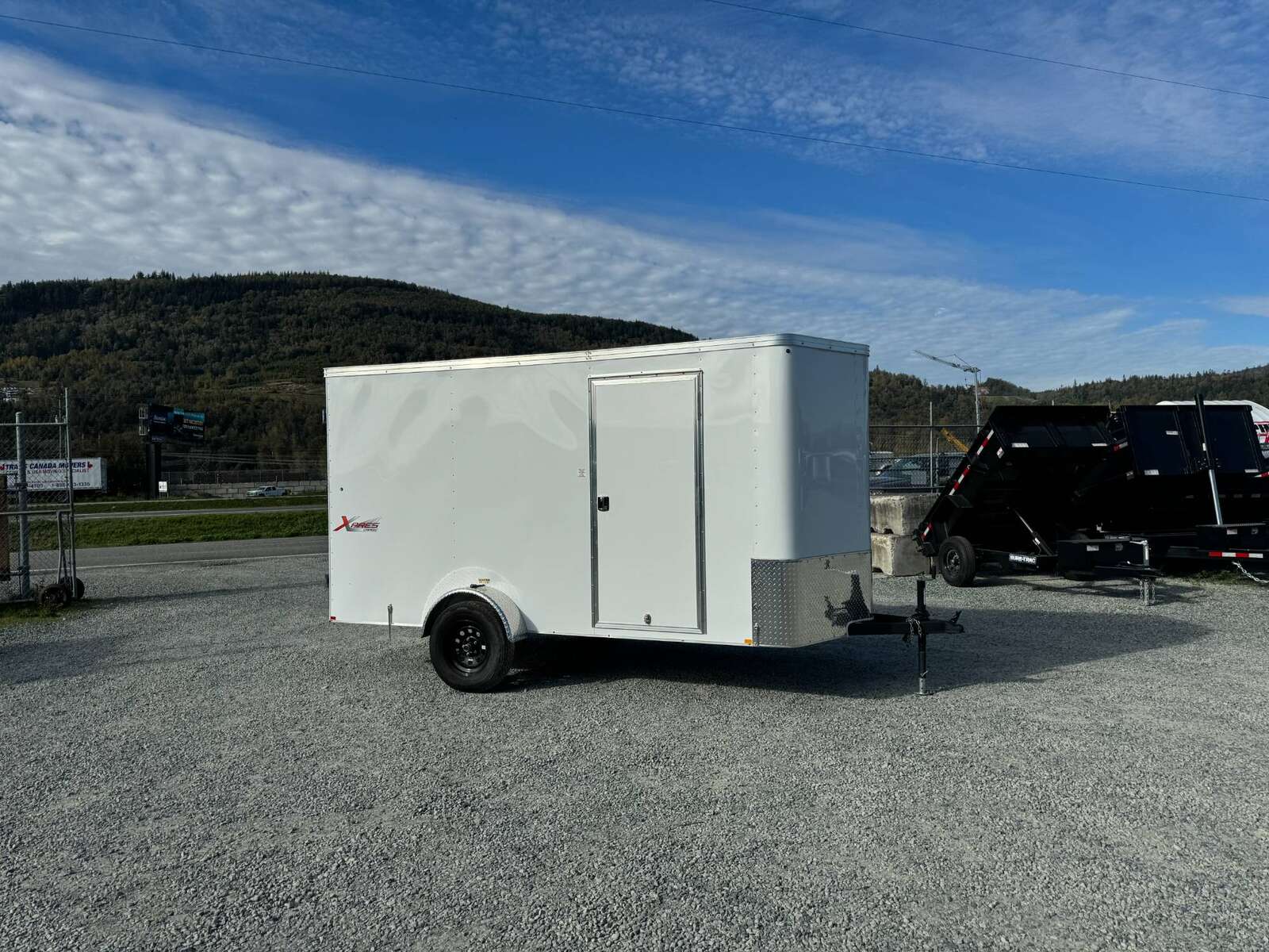 Photo of 2024 Mirage TRAX 6X12 V Nose Enclosed Cargo Trailer 2990GVW WHITE BARN DOOR