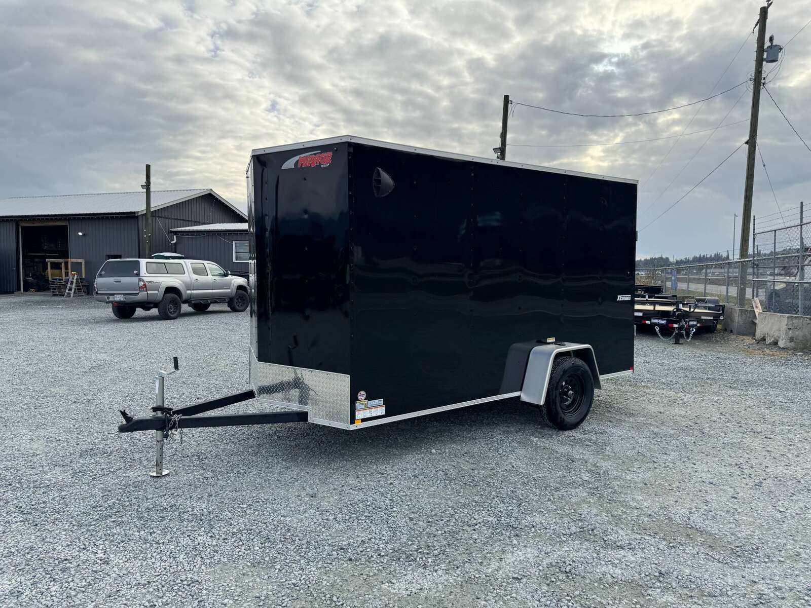 Photo of 2025 Mirage XE 6x12 V Nose Cargo / Enclosed Trailer Black Ramp Door Extra Height 2990lb GVW