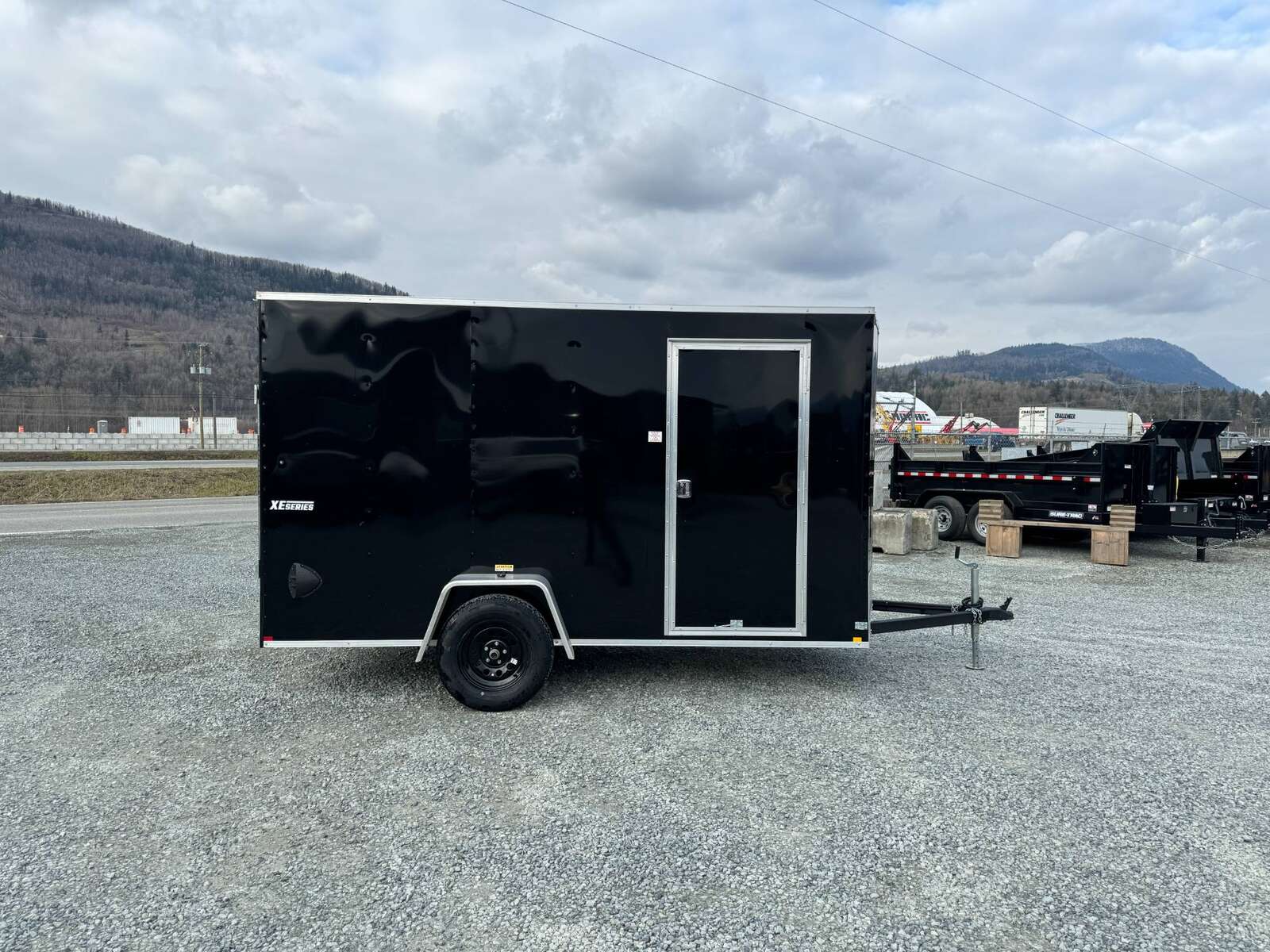 Photo of 2025 Mirage XE 6x12 V Nose Cargo / Enclosed Trailer Black Ramp Door Extra Height 2990lb GVW