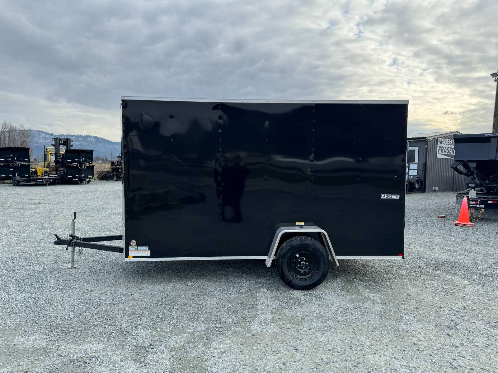 Photo of 2025 Mirage XE 6x12 V Nose Cargo / Enclosed Trailer Black Ramp Door Extra Height 2990lb GVW