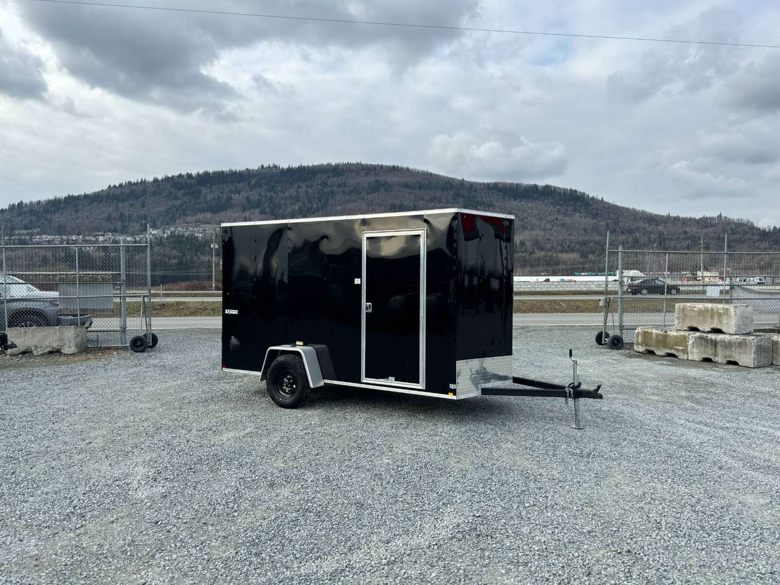 Photo of 2025 Mirage XE 6x12 V Nose Cargo / Enclosed Trailer Black Ramp Door Extra Height 2990lb GVW