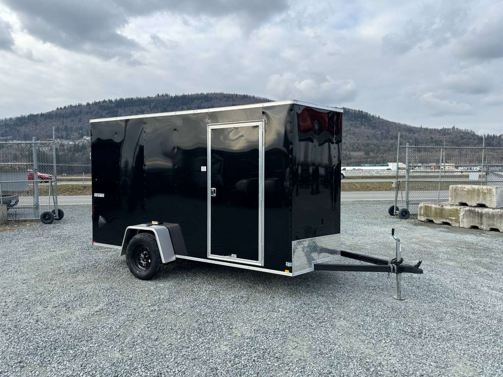 Photo of 2025 Mirage XE 6x12 V Nose Cargo / Enclosed Trailer Black Ramp Door Extra Height 2990lb GVW