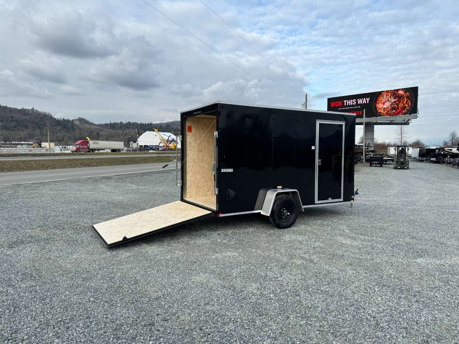 Photo of 2025 Mirage XE 6x12 V Nose Cargo / Enclosed Trailer Black Ramp Door Extra Height 2990lb GVW