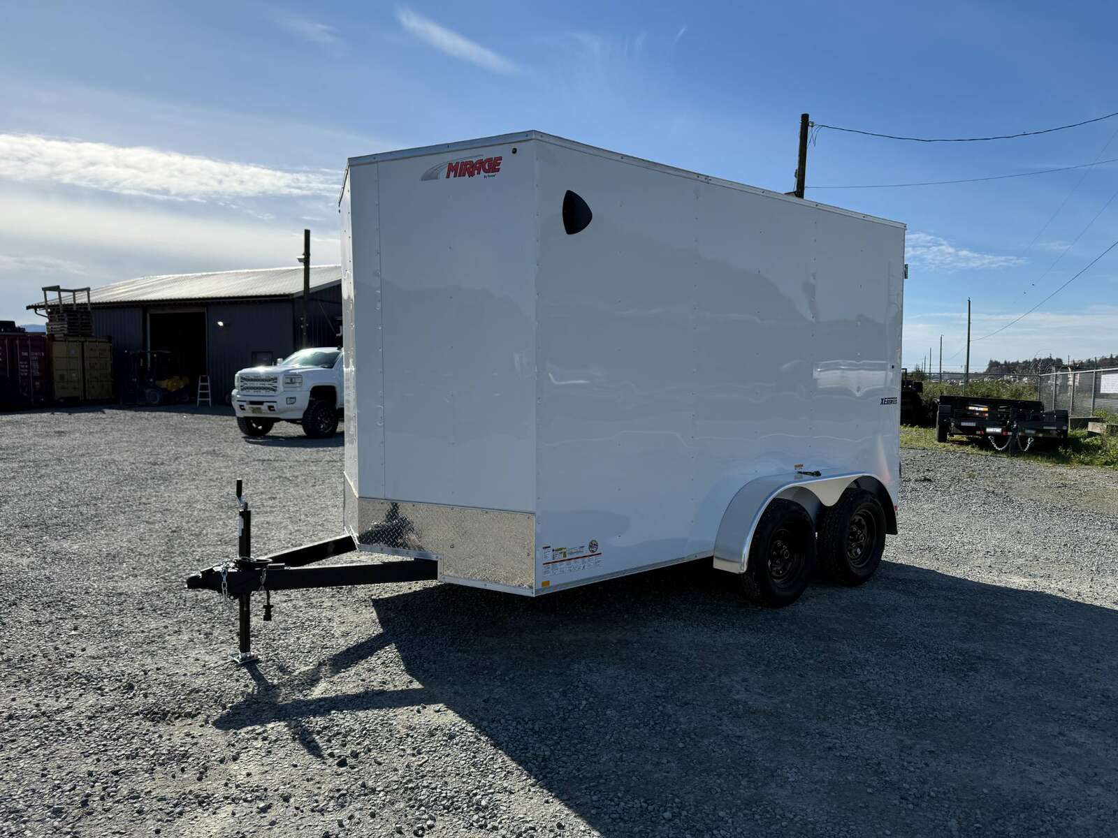 Photo of 2025 Mirage Trailers XE 7x12 V Nose Cargo / Enclosed Trailer Tandem Axle Extra Height Rear Barn Doors White 7000lb GVW