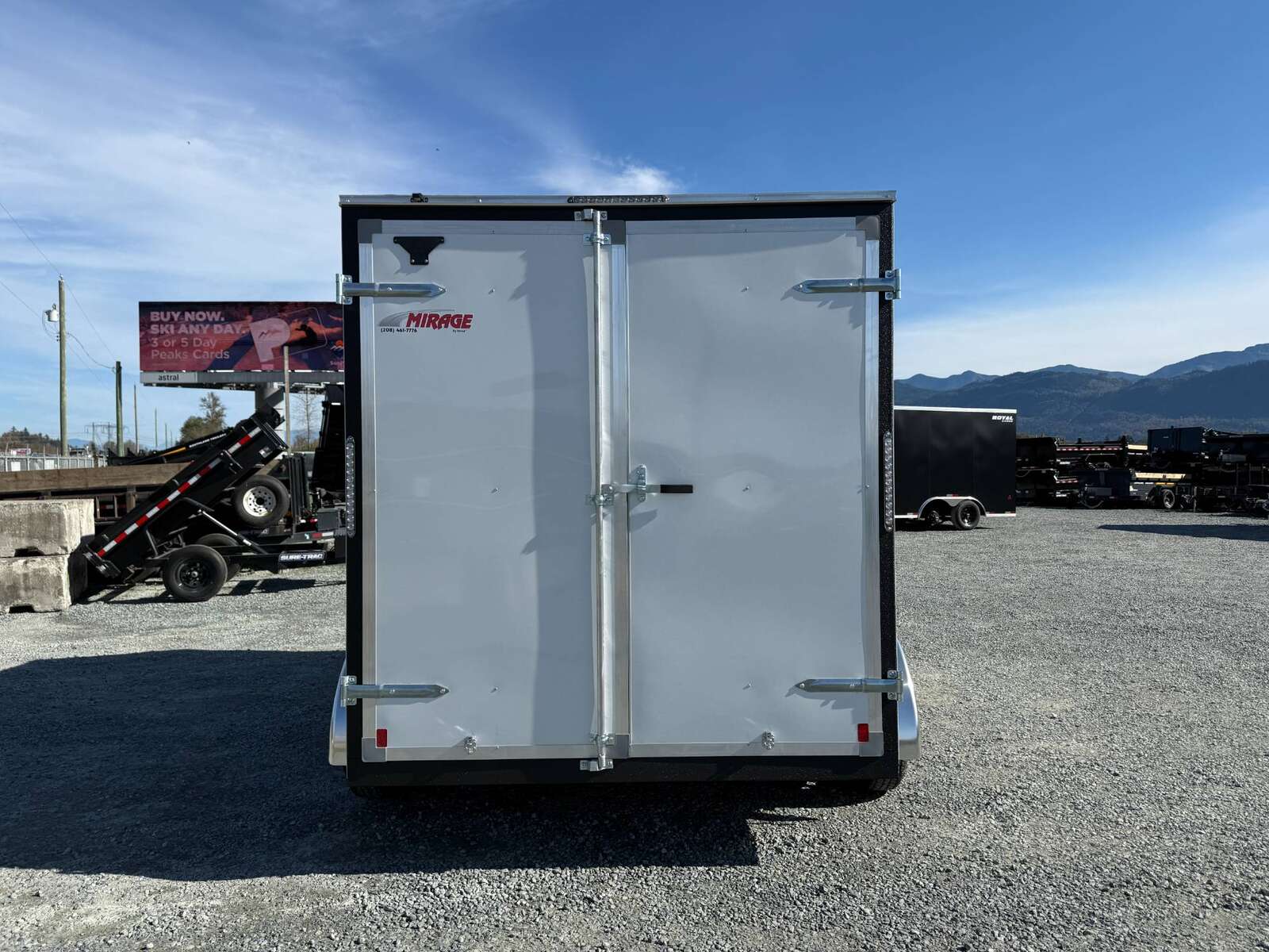 Photo of 2025 Mirage Trailers XE 7x12 V Nose Cargo / Enclosed Trailer Tandem Axle Extra Height Rear Barn Doors White 7000lb GVW