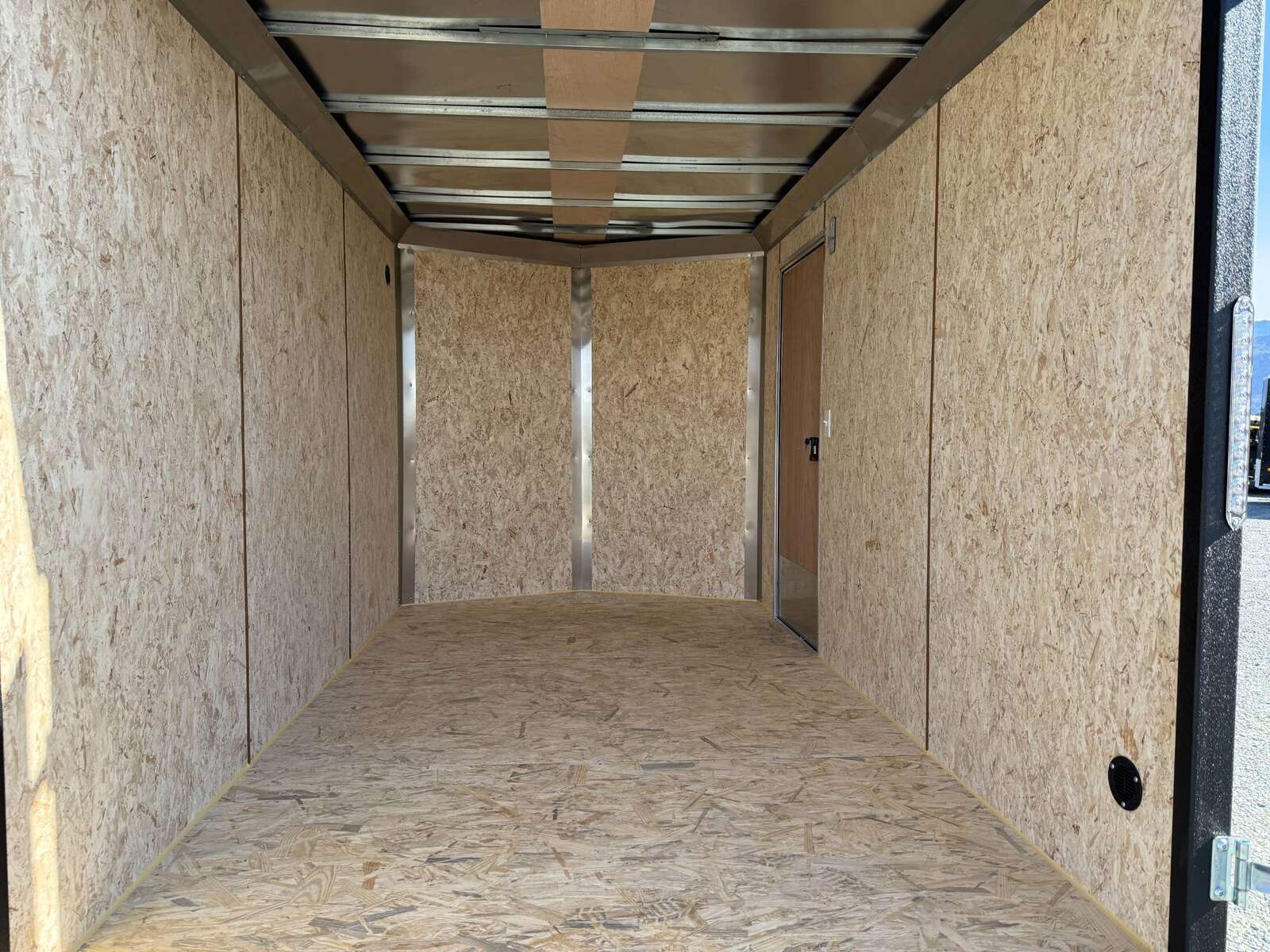 Photo of 2025 Mirage Trailers XE 7x12 V Nose Cargo / Enclosed Trailer Tandem Axle Extra Height Rear Barn Doors White 7000lb GVW