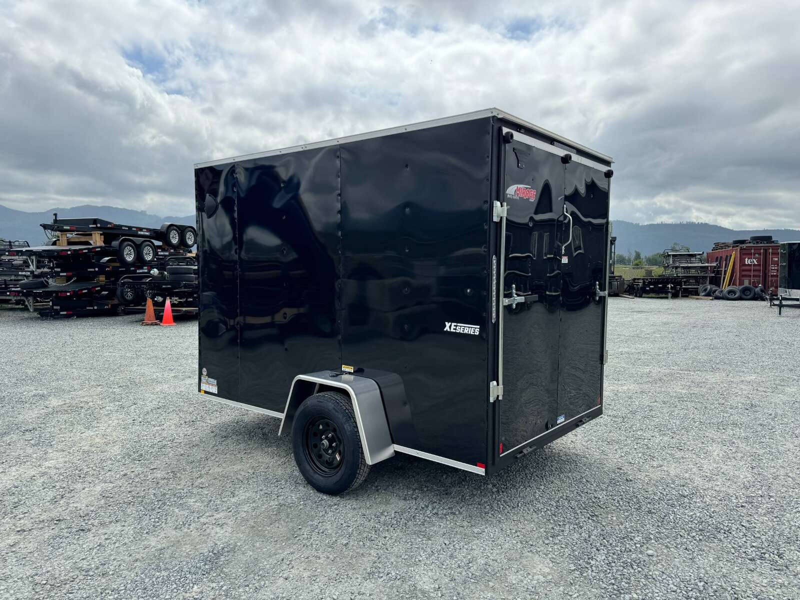 Photo of 2025 Mirage XE 6X10 CAMPING PACKAGE Cargo / Enclosed Trailer SIDE WINDOW BLACK RAMP DOOR EXTRA HEIGHT